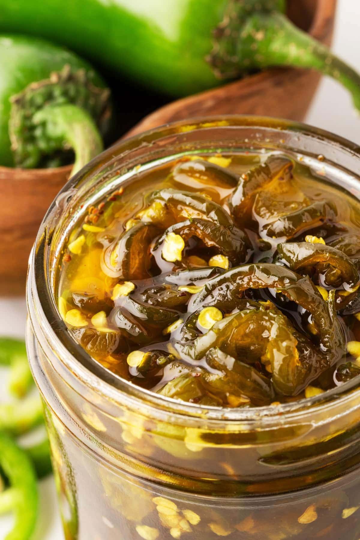 Candied jalapenos in a jar.
