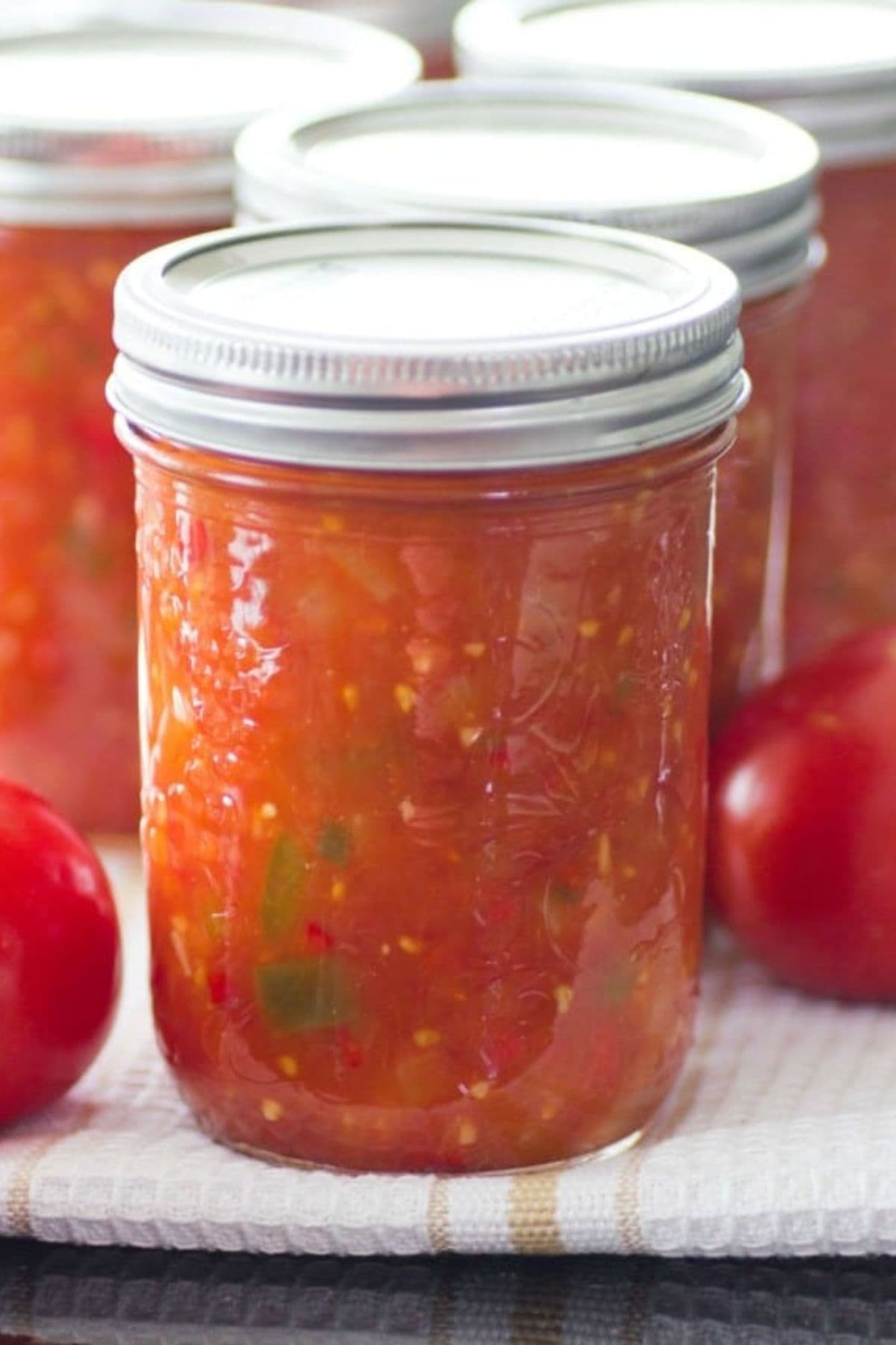 Salsa canned in a small jar.