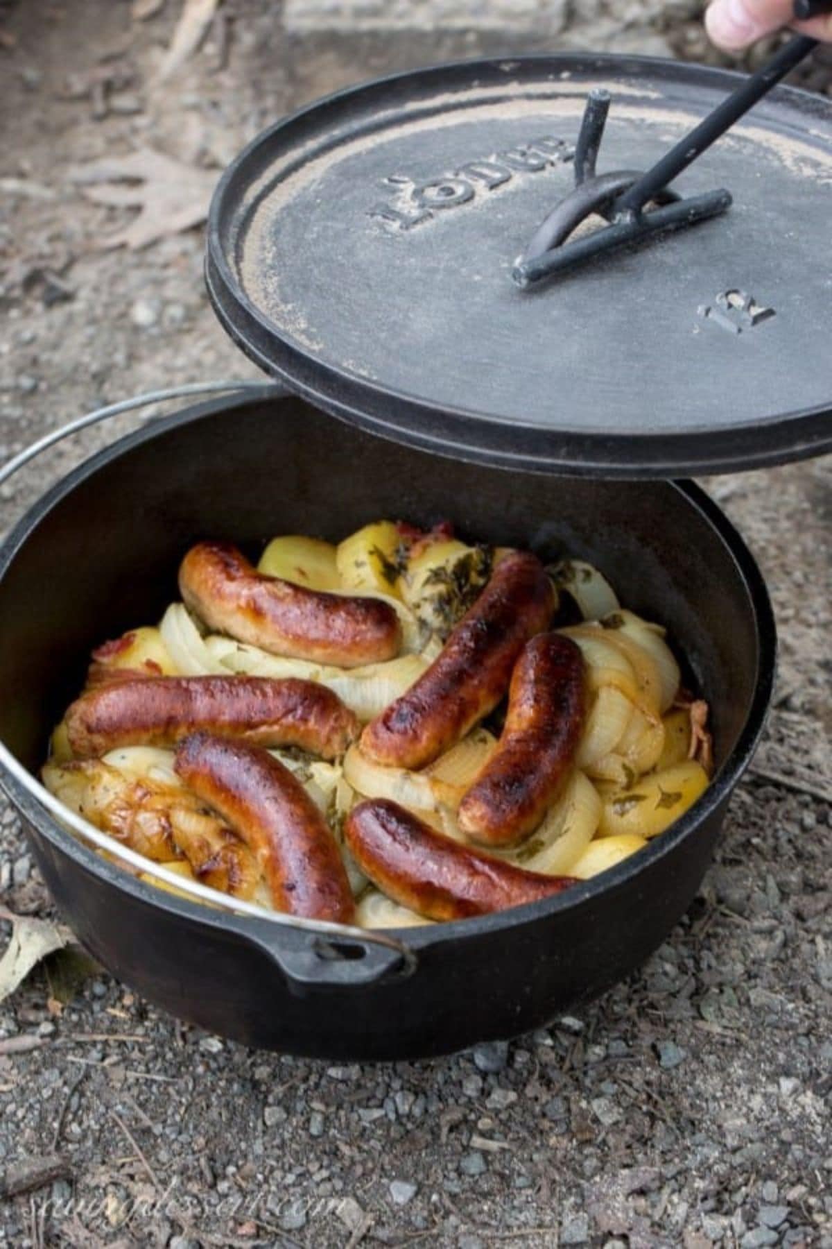 Are you enjoying the great outdoors this summer and wondering what to eat? Try some of these 20 Awesome Campfire Recipes!! Dublin coddle in cast iron pot.
