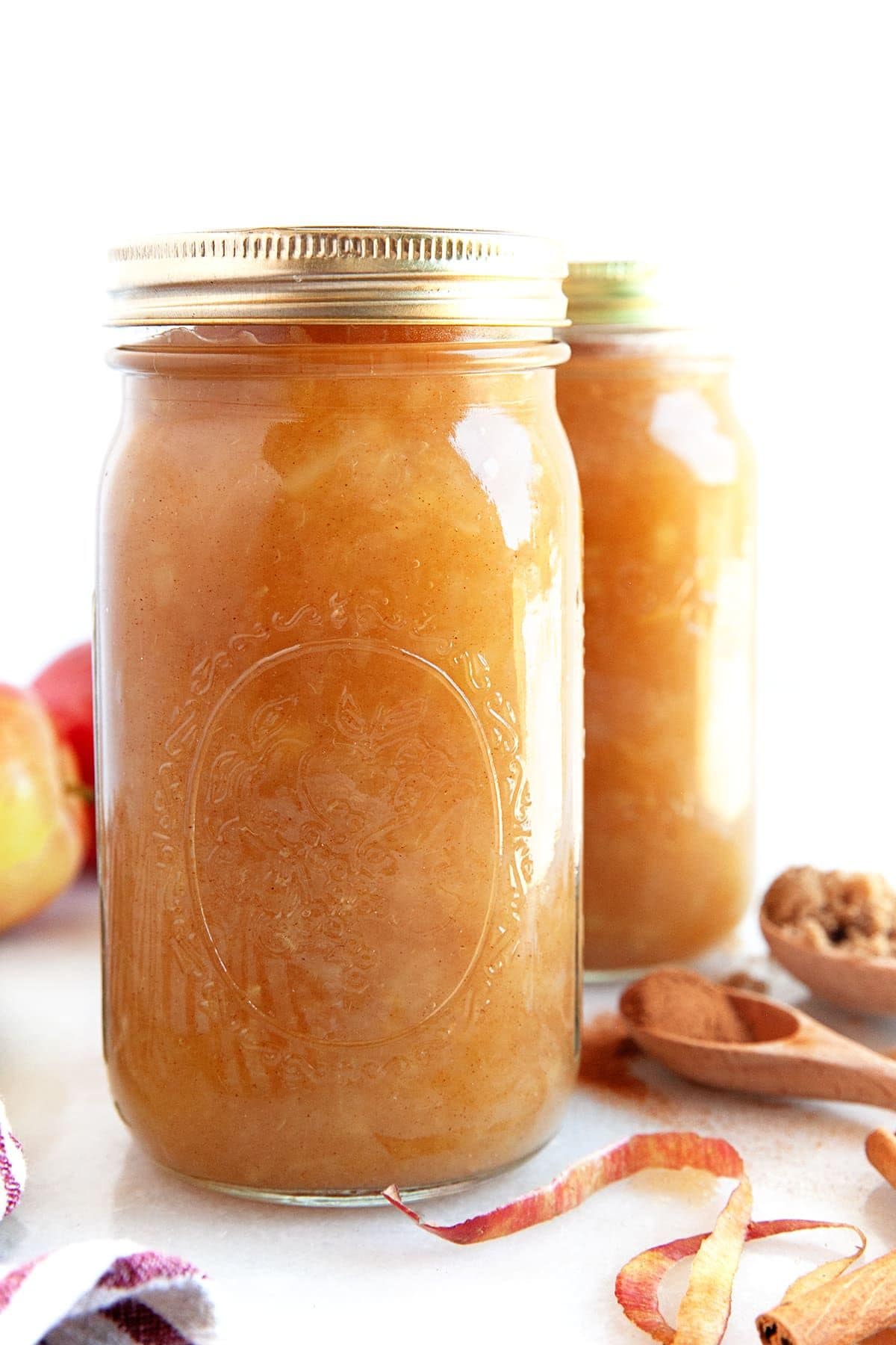 Quart sized jar full of applesauce.