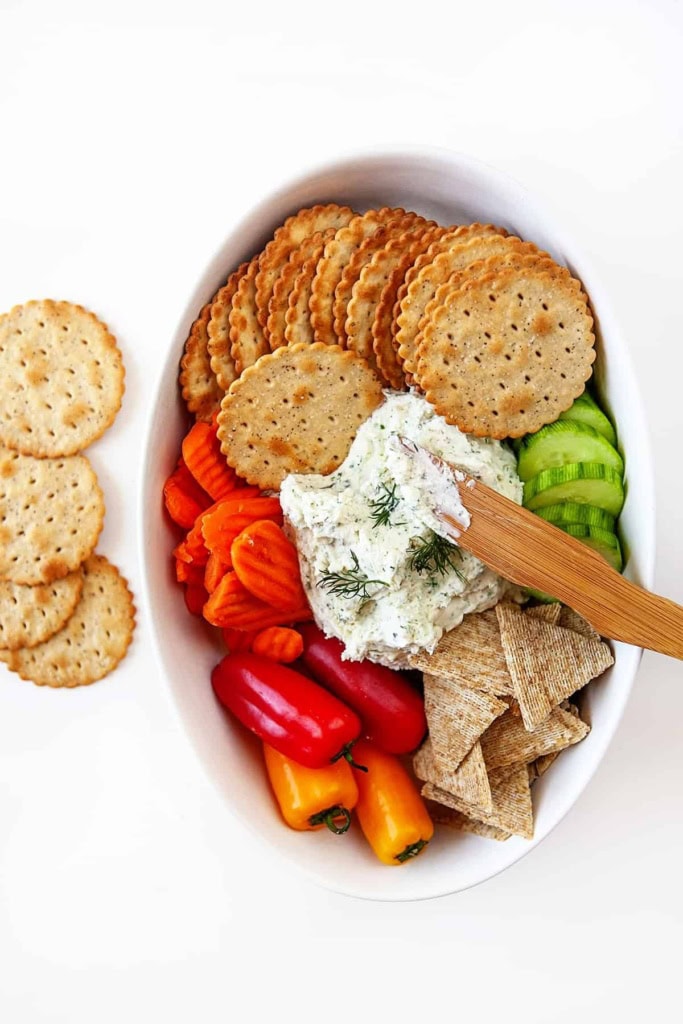 Bowl of boursin and crackers.