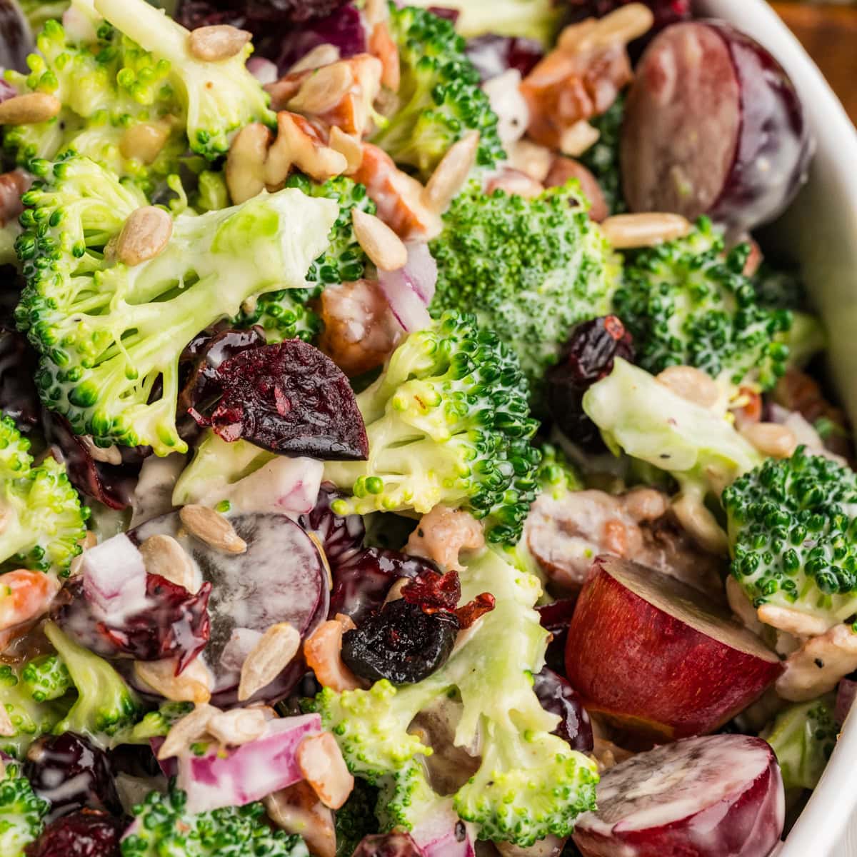 This Broccoli Salad is a keeper that you will want to bring out on a constant rotation. It is perfect for a summer BBQ, picnic or really at any time of the year. Super close-up of the salad.