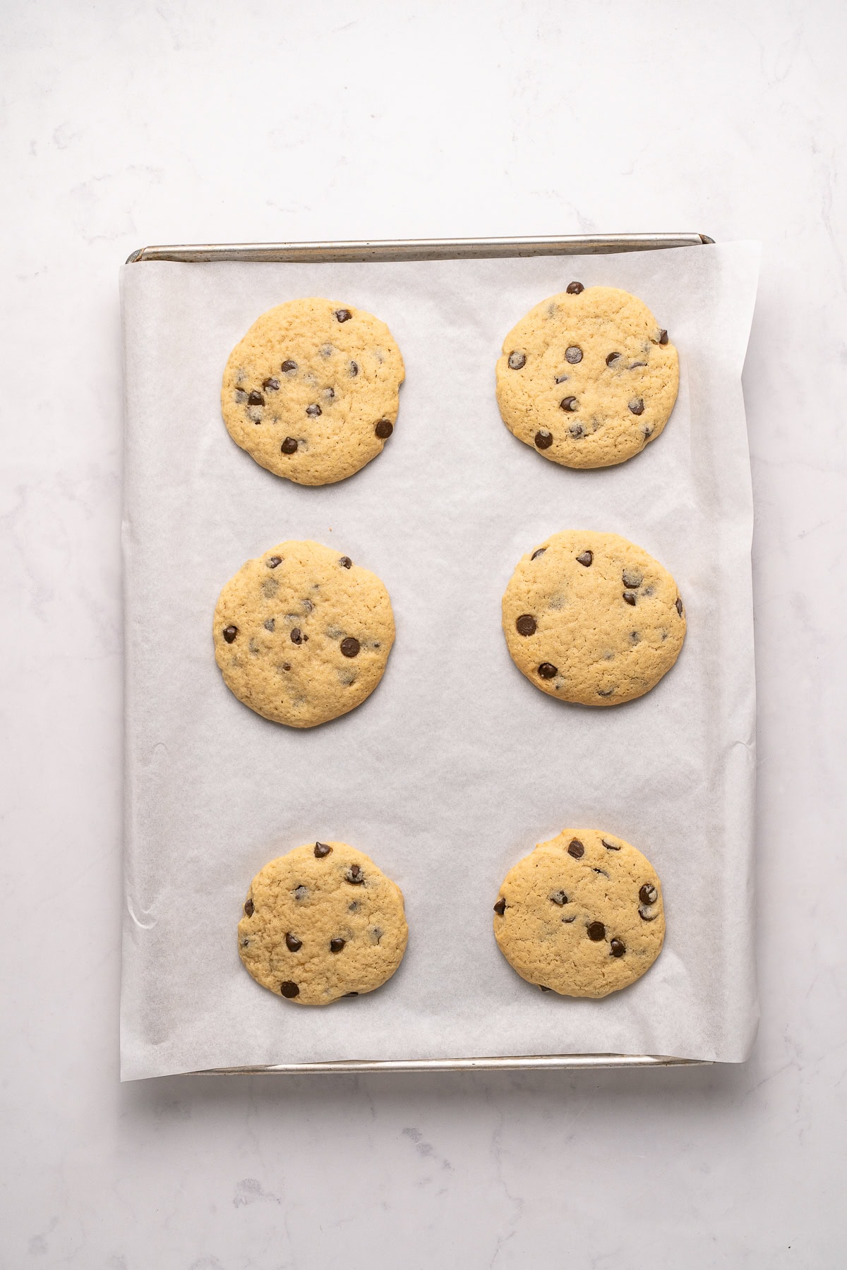 Make summer even more fun with these Cookie Ice Cream Sandwiches. These are a great make-ahead treat that is ready and waiting for you in the freezer for any time of the day. Freshly baked cookies.