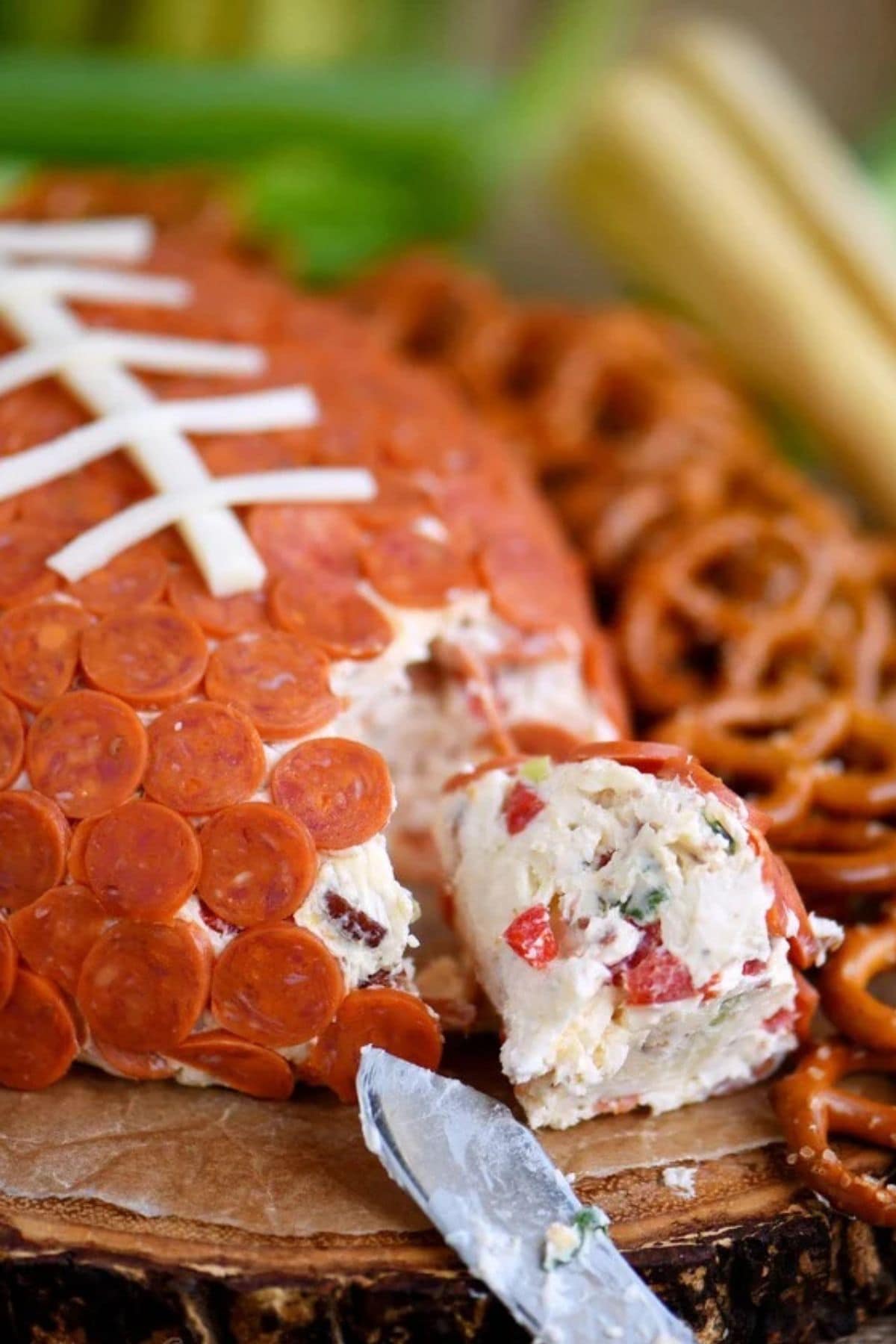 Football cheeseball on tray.