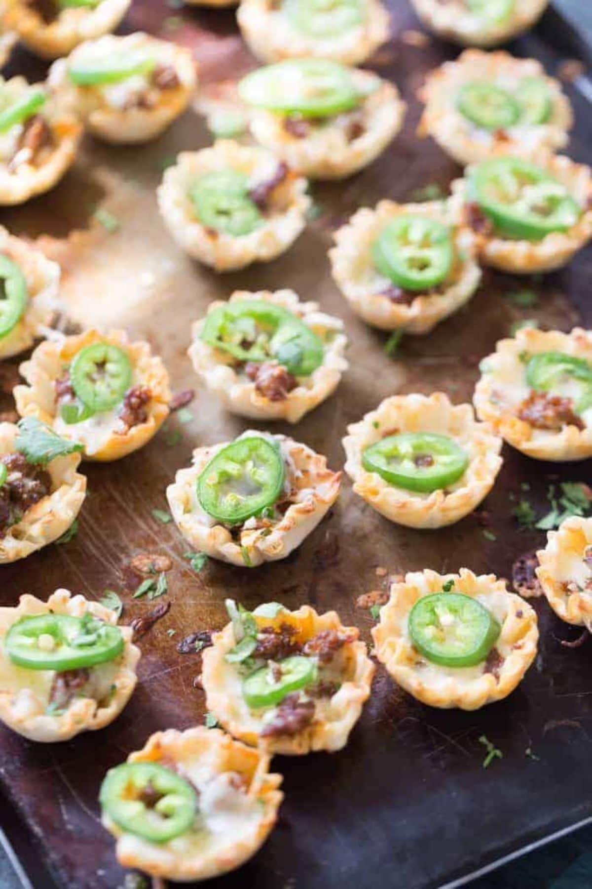 Queso bites on a cutting board.