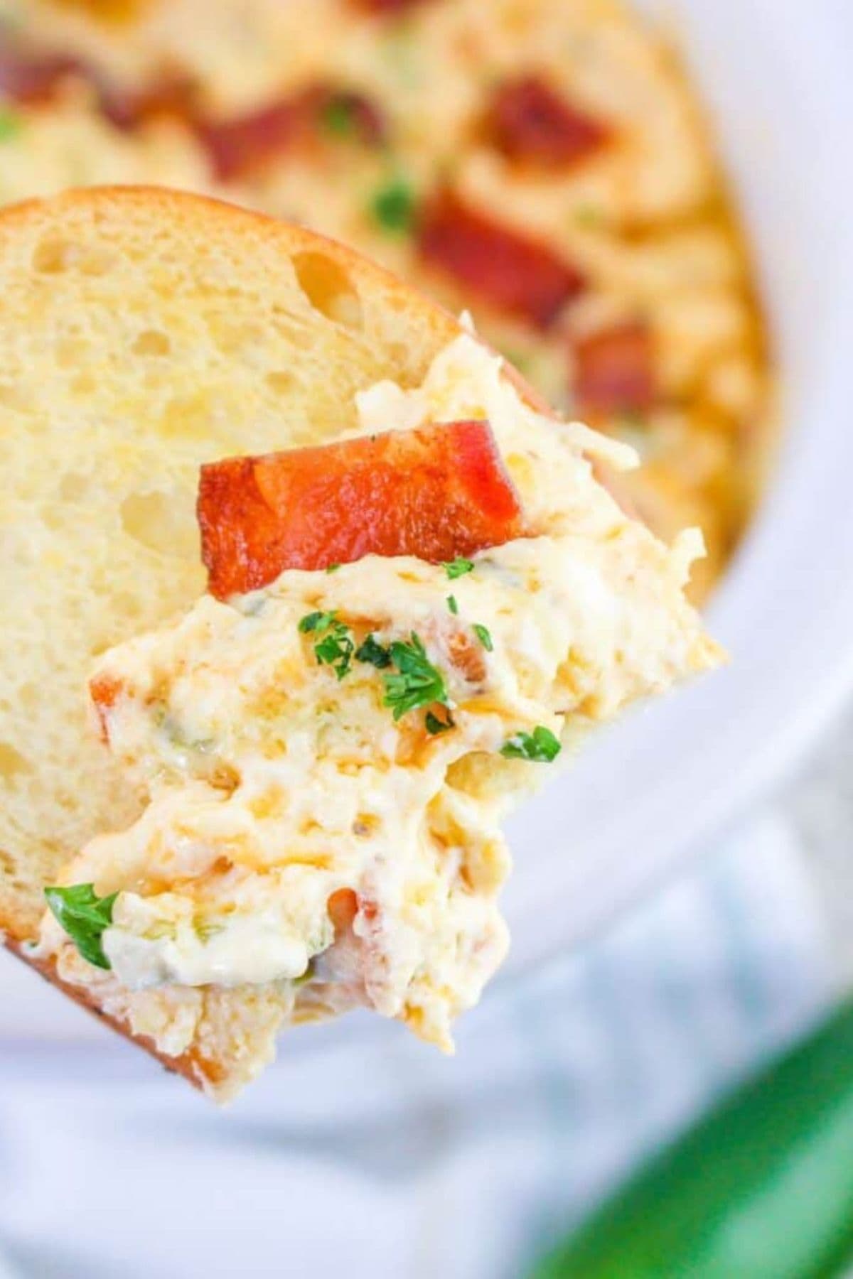 Jalapeno popper dip on a cracker.