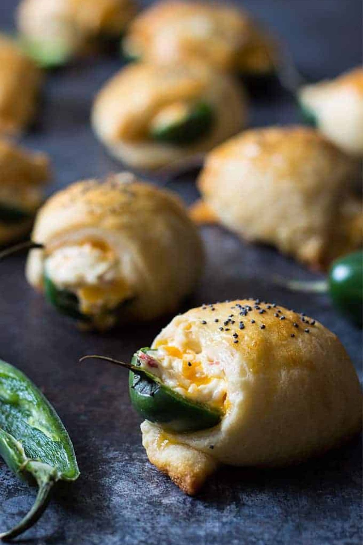 Jalapeno poppers on a backdrop.
