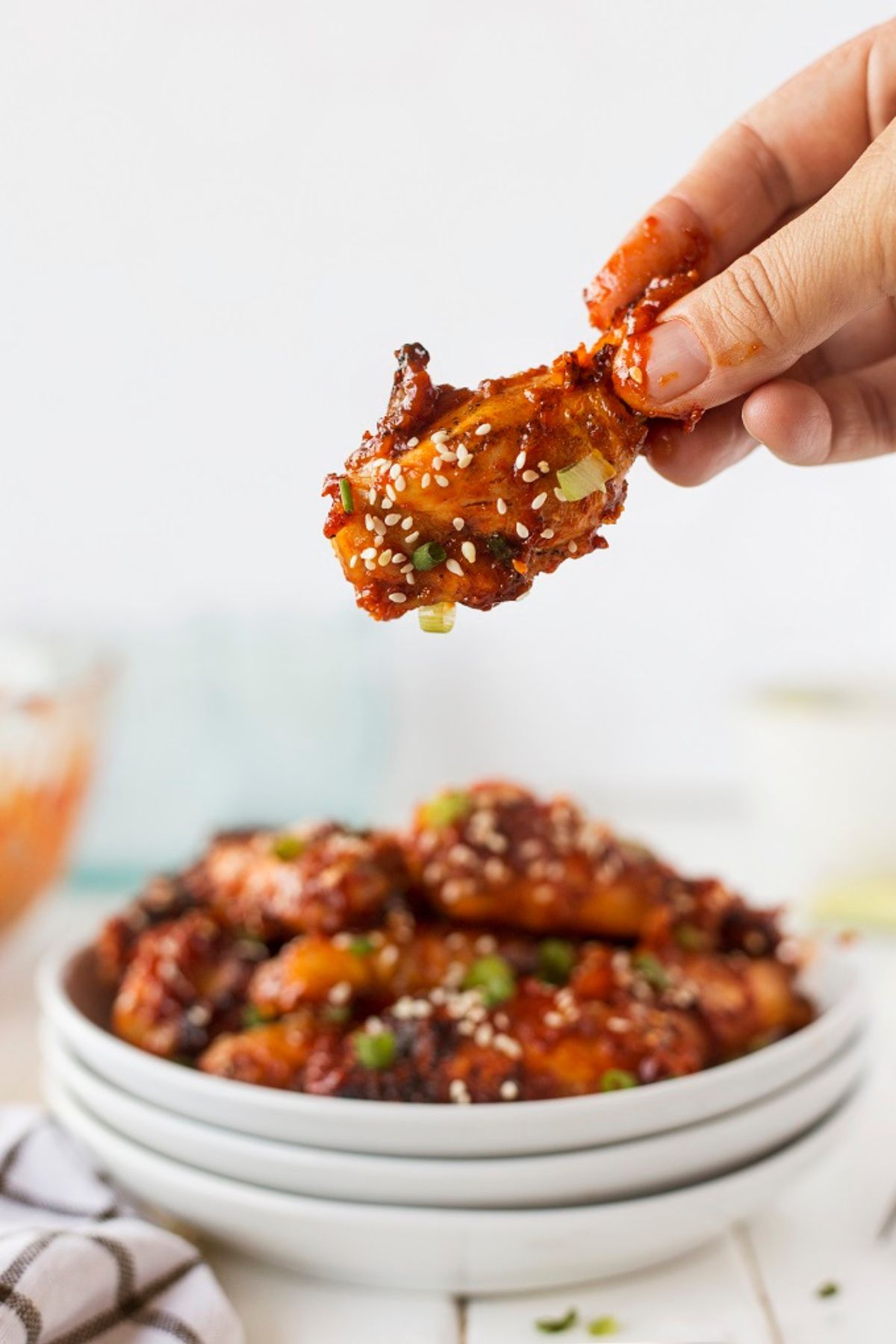 Korean wings on a plate.