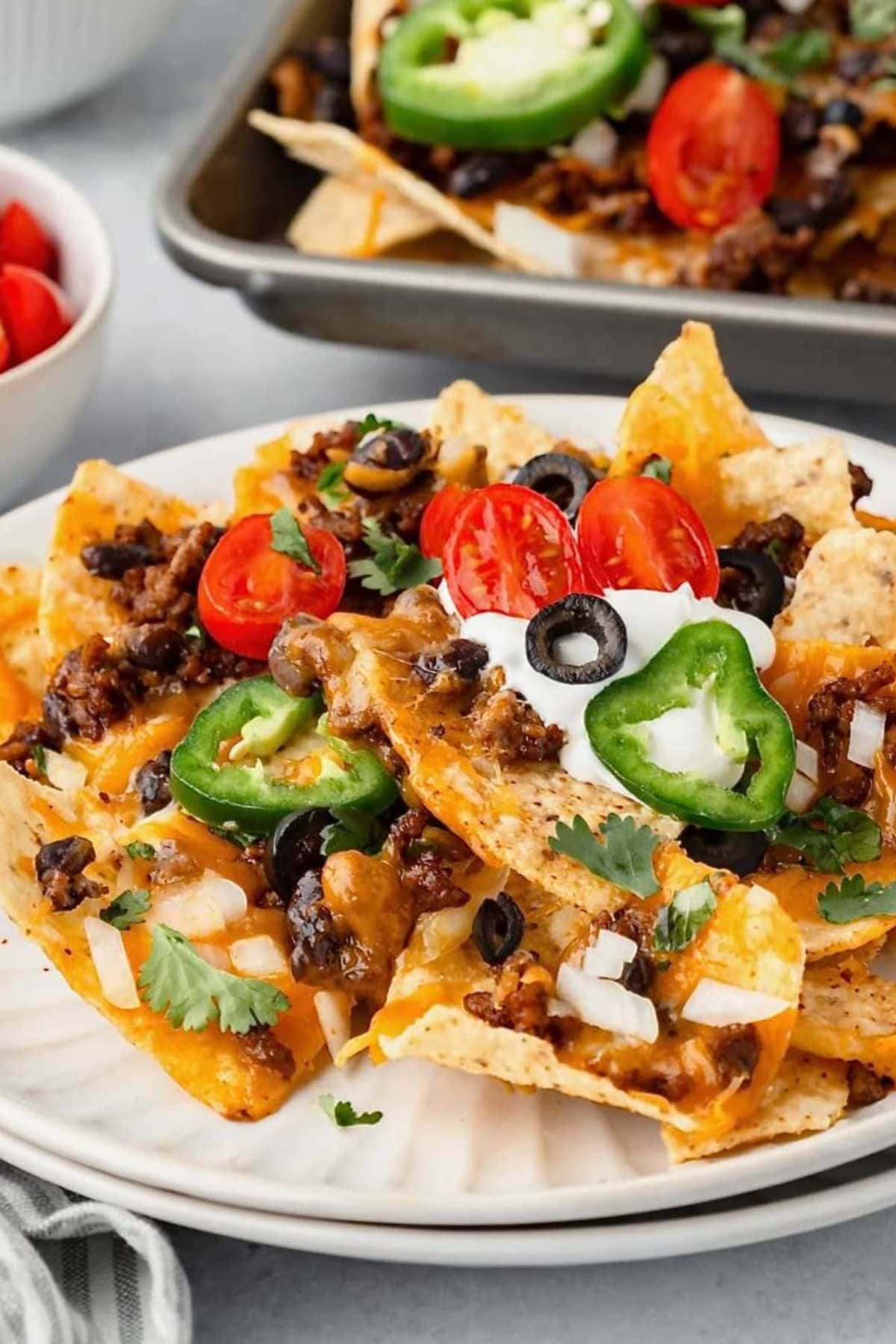 Loaded Nachos on a plate.