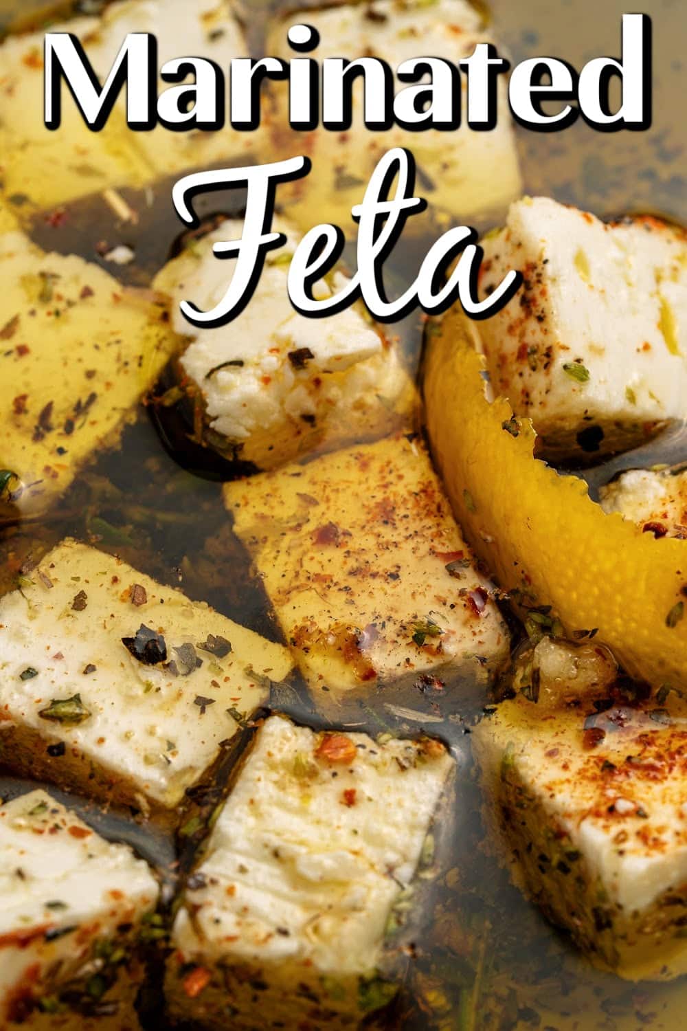 Marinated Feta is a great appetizer on its own or added to a charcuterie or Mediterranean platter. It is also amazing with a summer salad or Greek salad. Marinated Feta Pin.