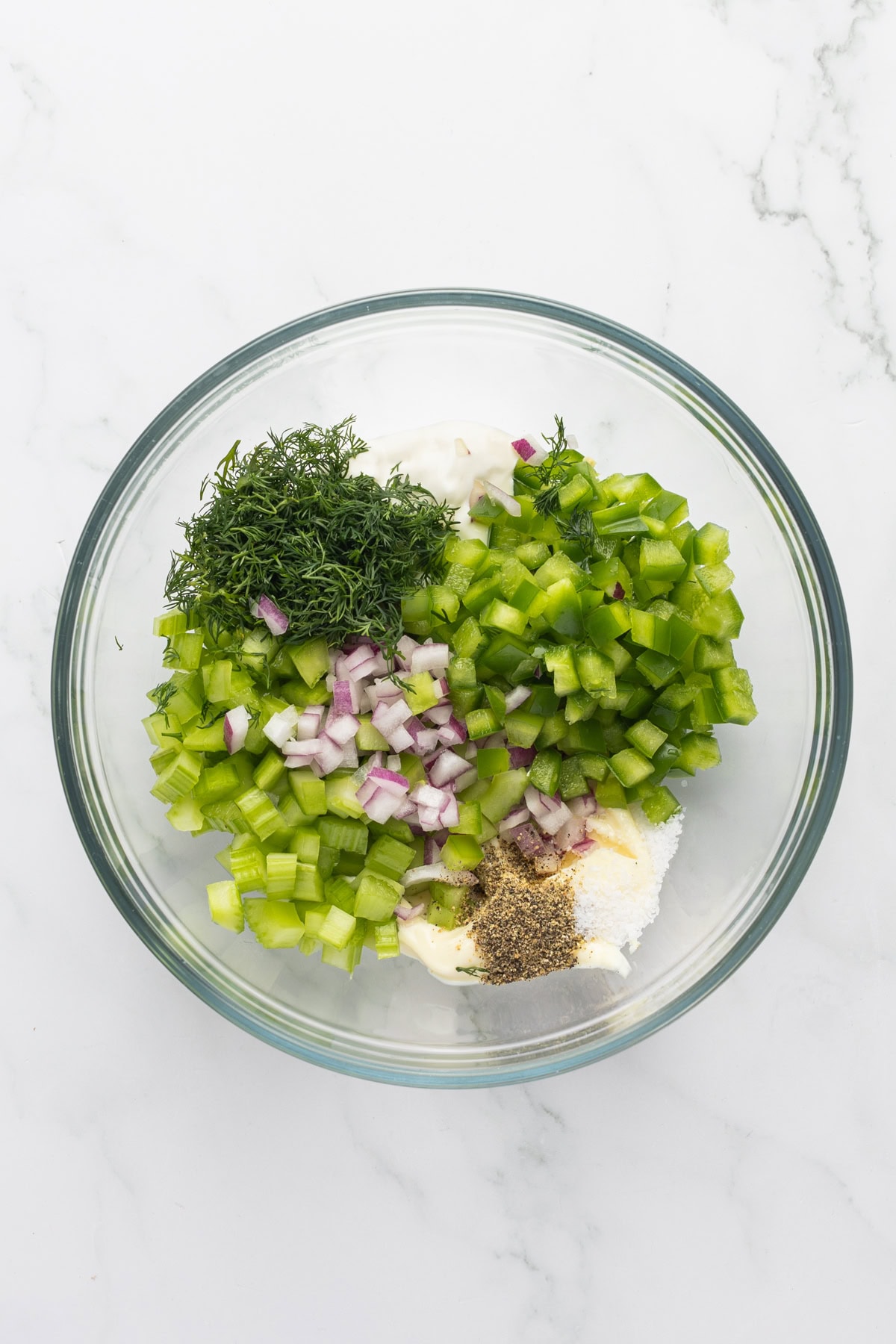 Chopped veggies added to the dressing. 