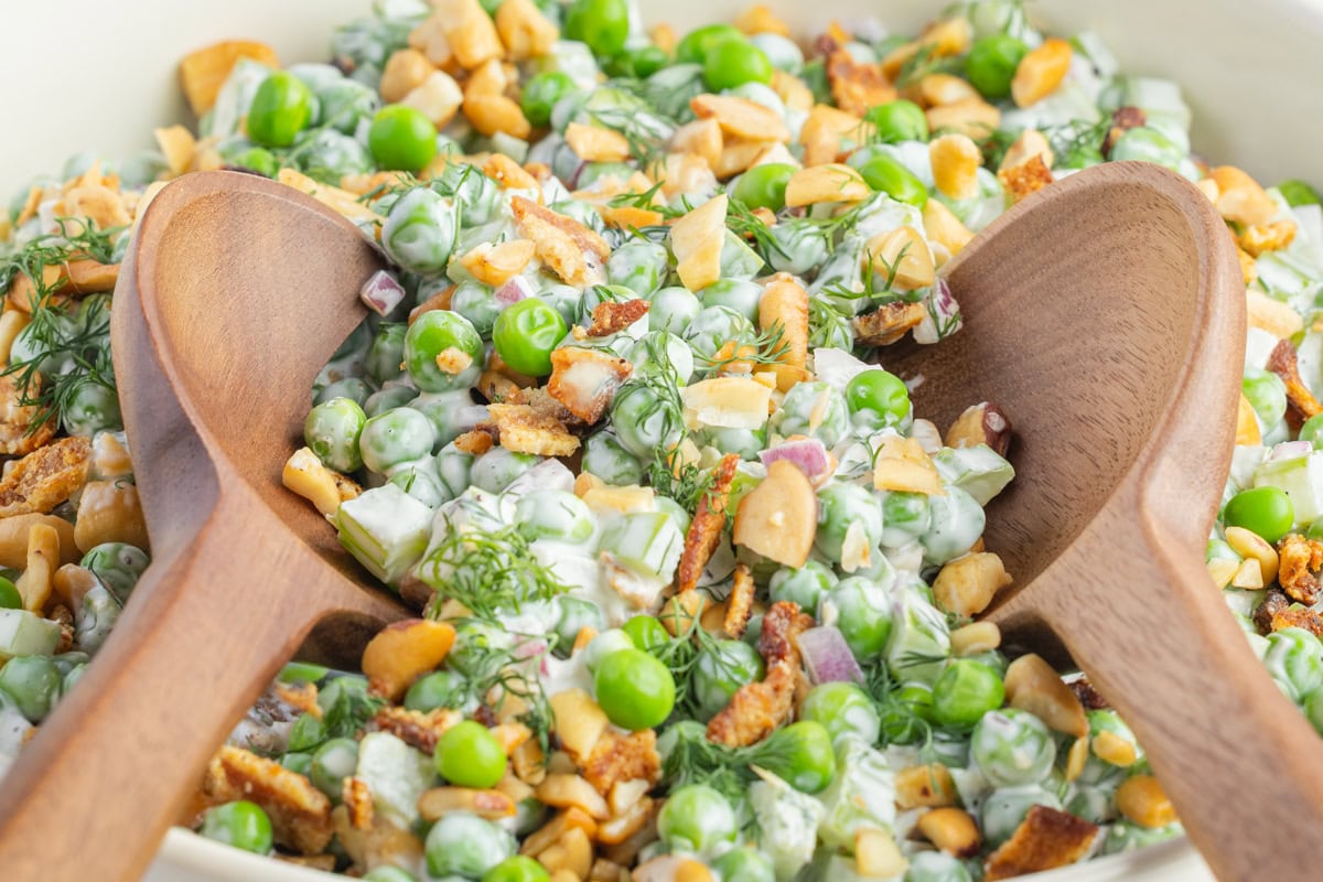Pea salad with two spoons. 