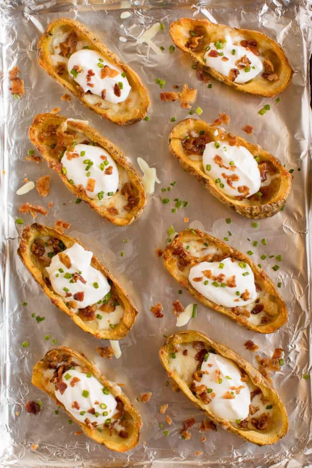 Potato skins on baking sheet.