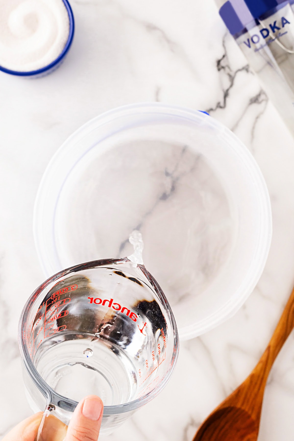 Adding in hot water.