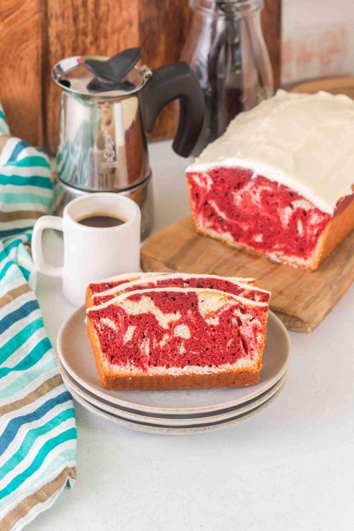 These 12 Canada Day Recipes are sure to please everyone at all your celebrations. Everyone will be diving in to enjoy all of these festive recipes. Two pieces of marble cake on a plate.