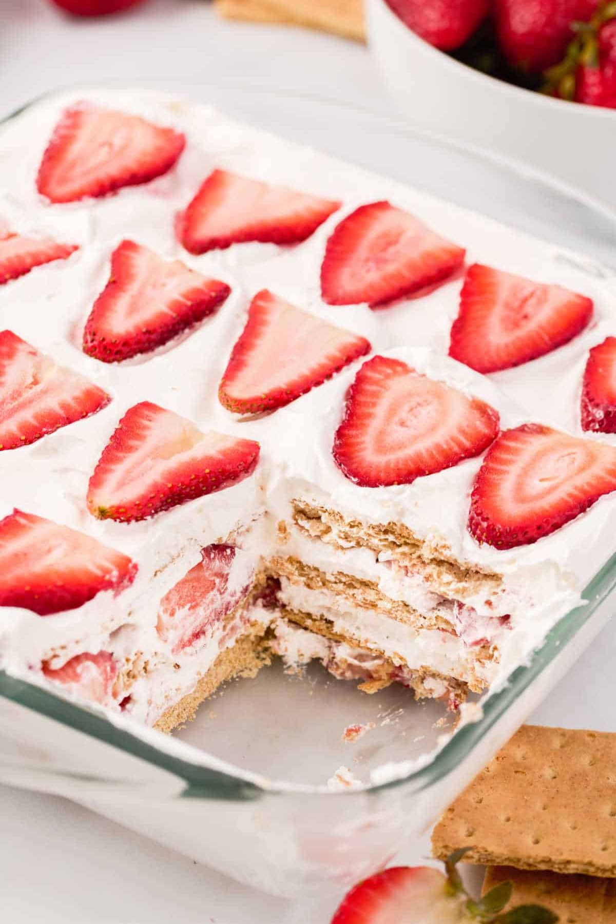 These 12 Canada Day Recipes are sure to please everyone at all your celebrations. Everyone will be diving in to enjoy all of these festive recipes. Icebox cake in glass baking dish.
