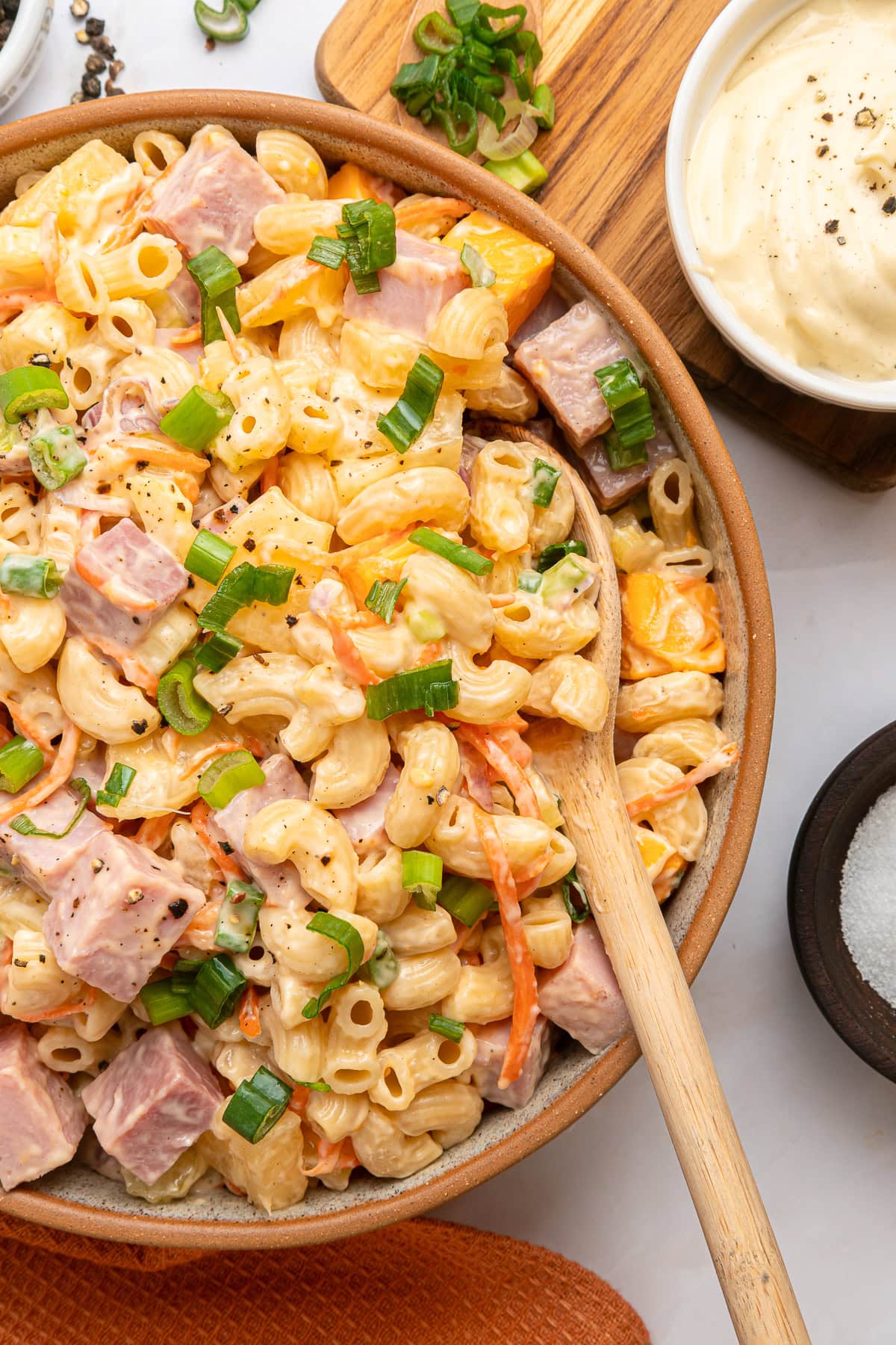 This Hawaiian Macaroni Salad is easy to pull together for a BBQ, gathering, picnic or even a lunchbox. It is inspired by a mouthwatering Hawaiian pizza. Creamy hawaiian macaroni salad.
