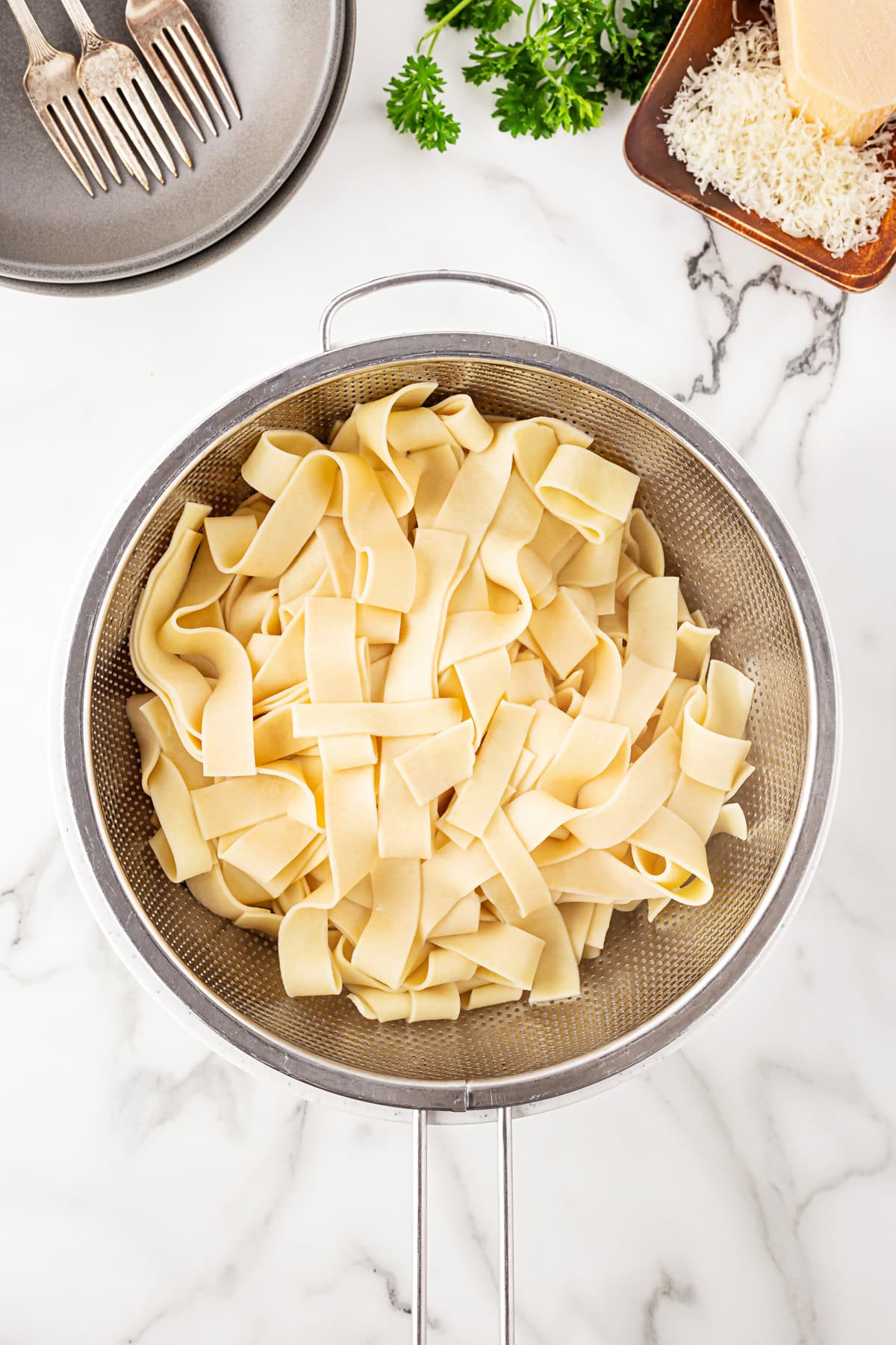 Pasta in a strainer. 