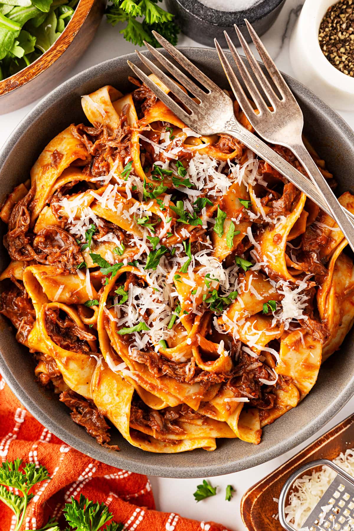 Short Rib Beef Ragu overhead served with two forks. 