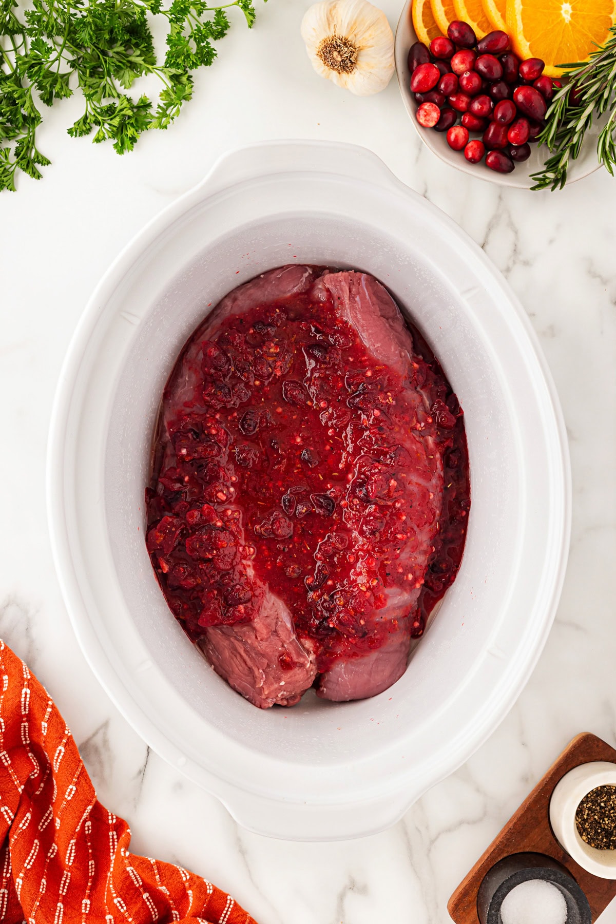 Pork tenderloin in the slow cooker with sauce. 