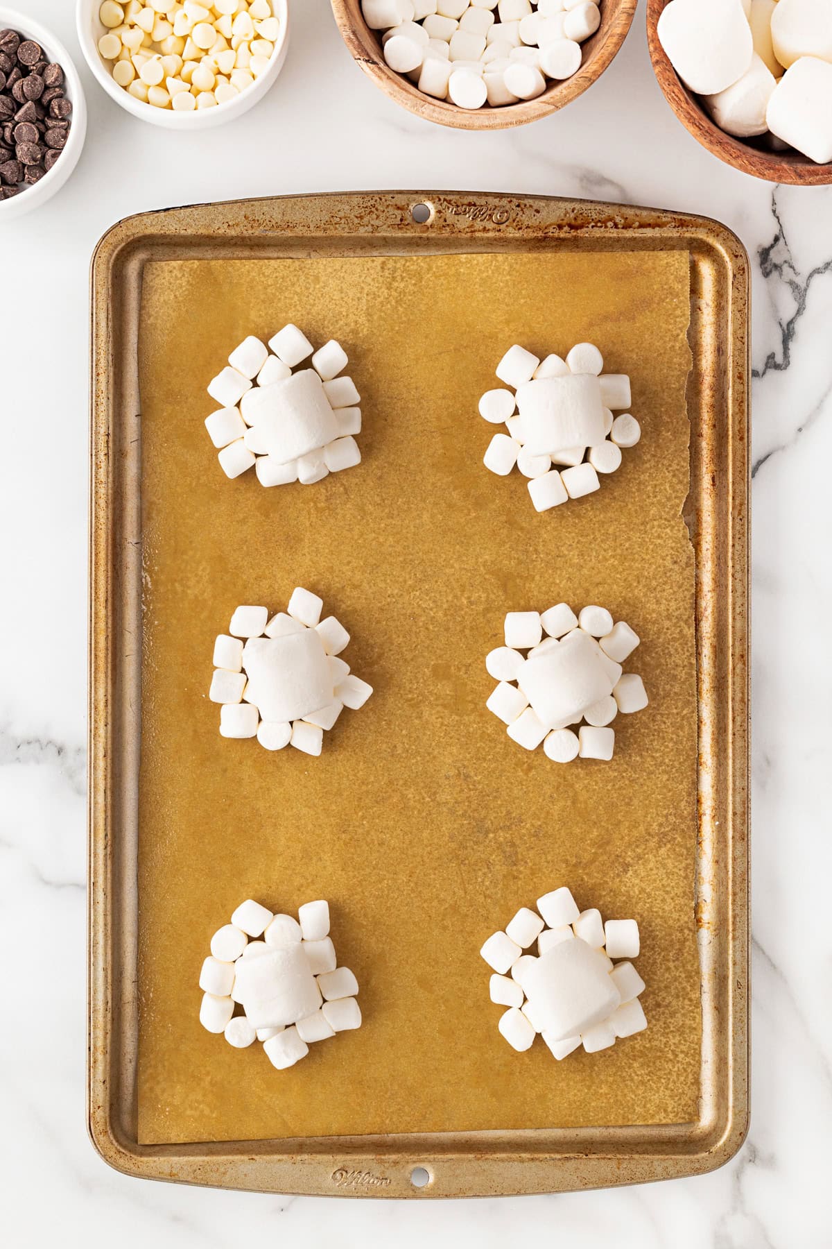 Large and small marshmallows piled. 
