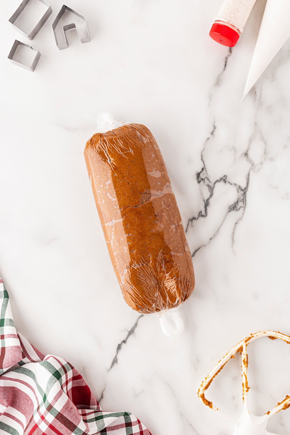 Dough wrapped in plastic. 