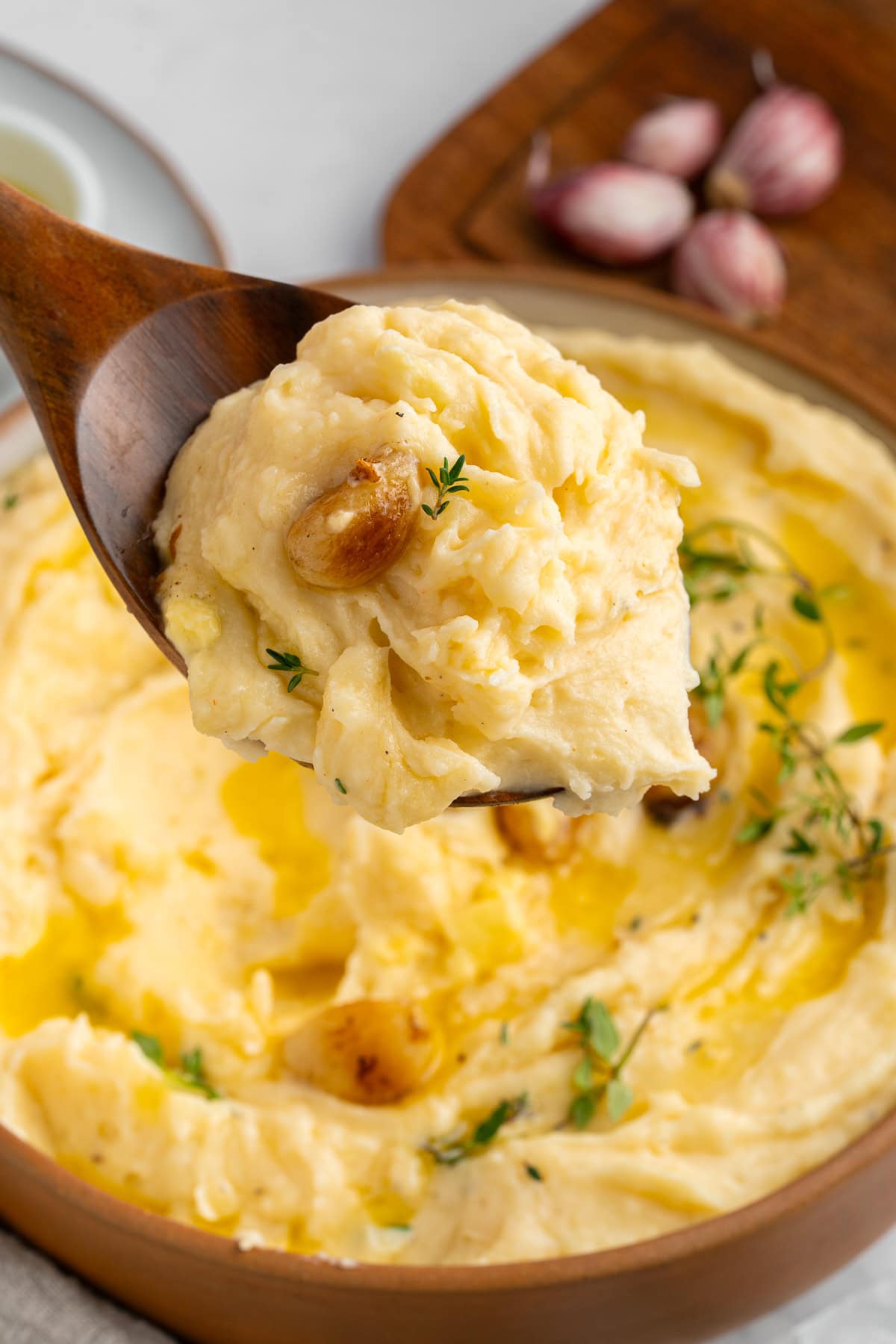 Spooned roasted garlic mashed potatoes.