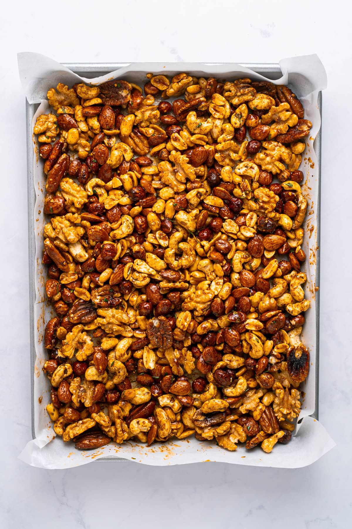 Nuts coated with spice mixture.