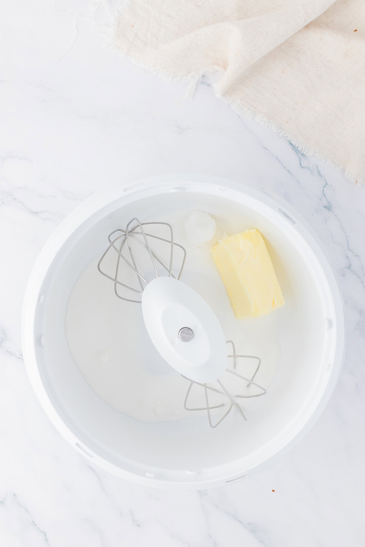 Butter and sugar in bowl.