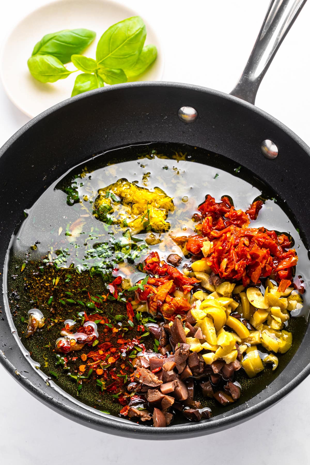 Mixing bread dipping oil ingredients.