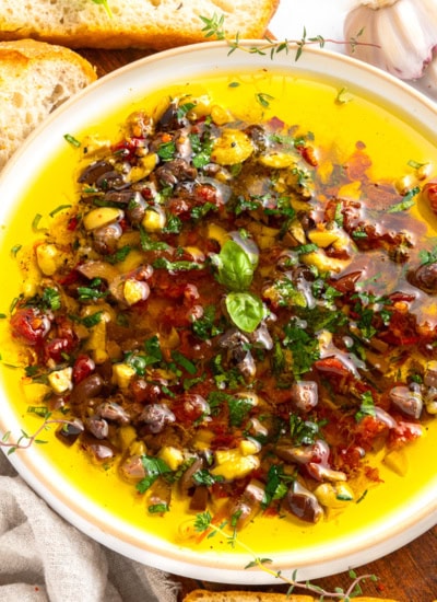 Close-up of bread dipping oil.