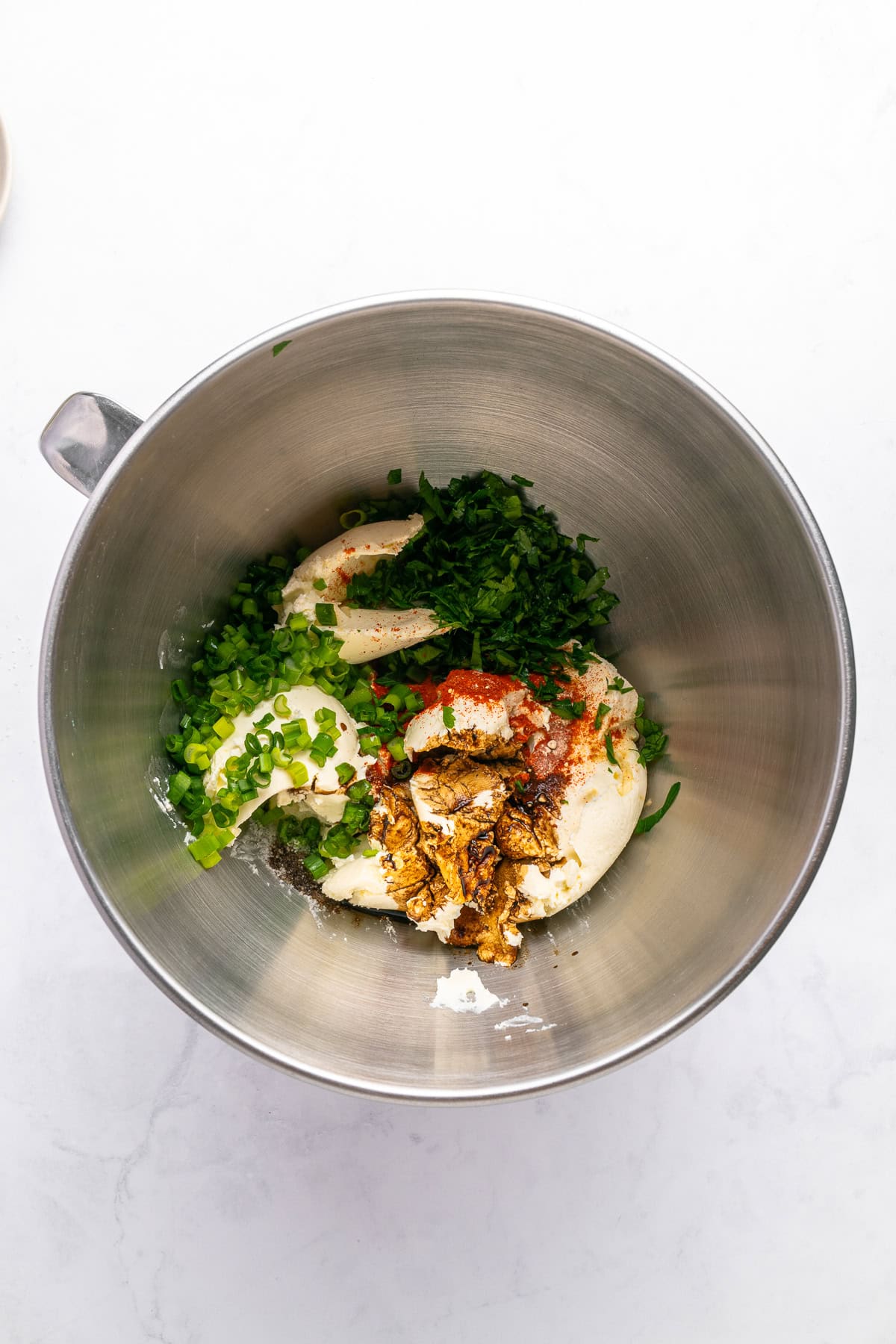 Cream cheese, herbs and spices. 