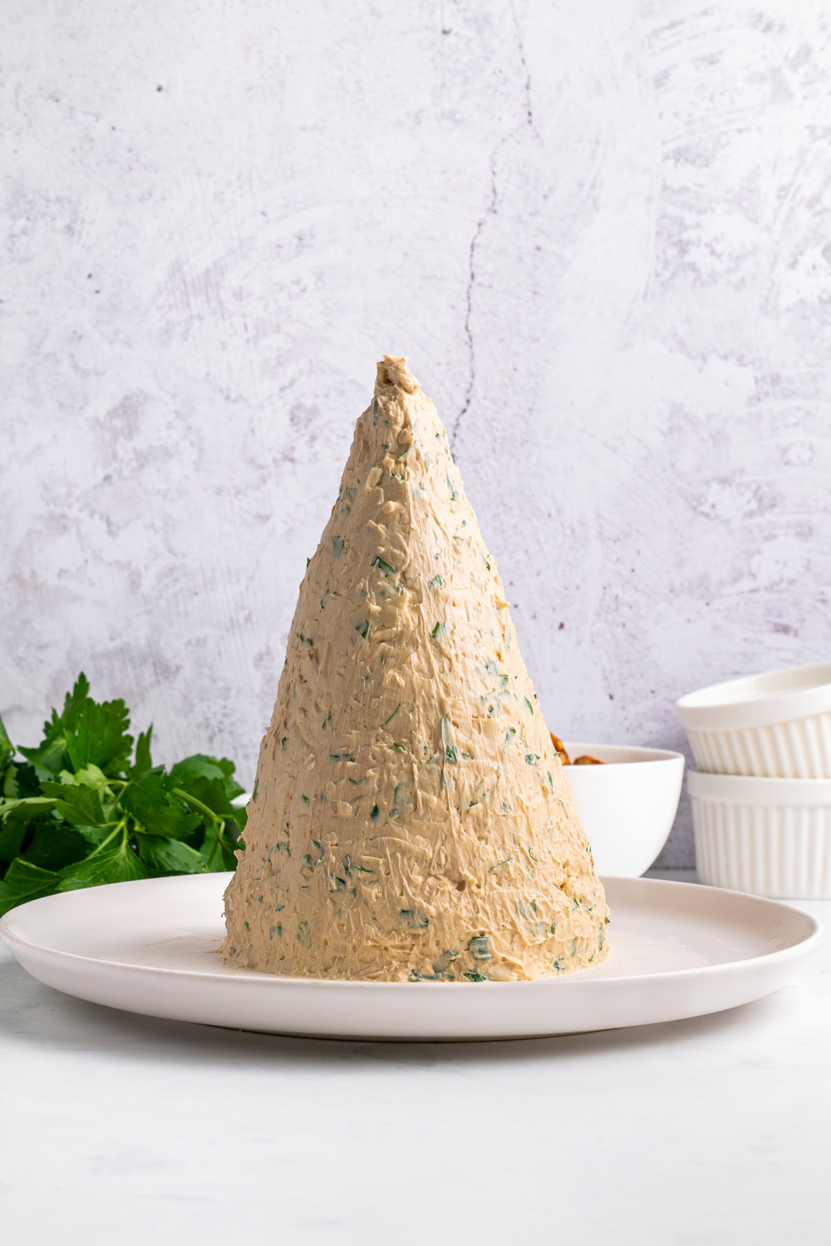 Formed into a cone or tree shape. 