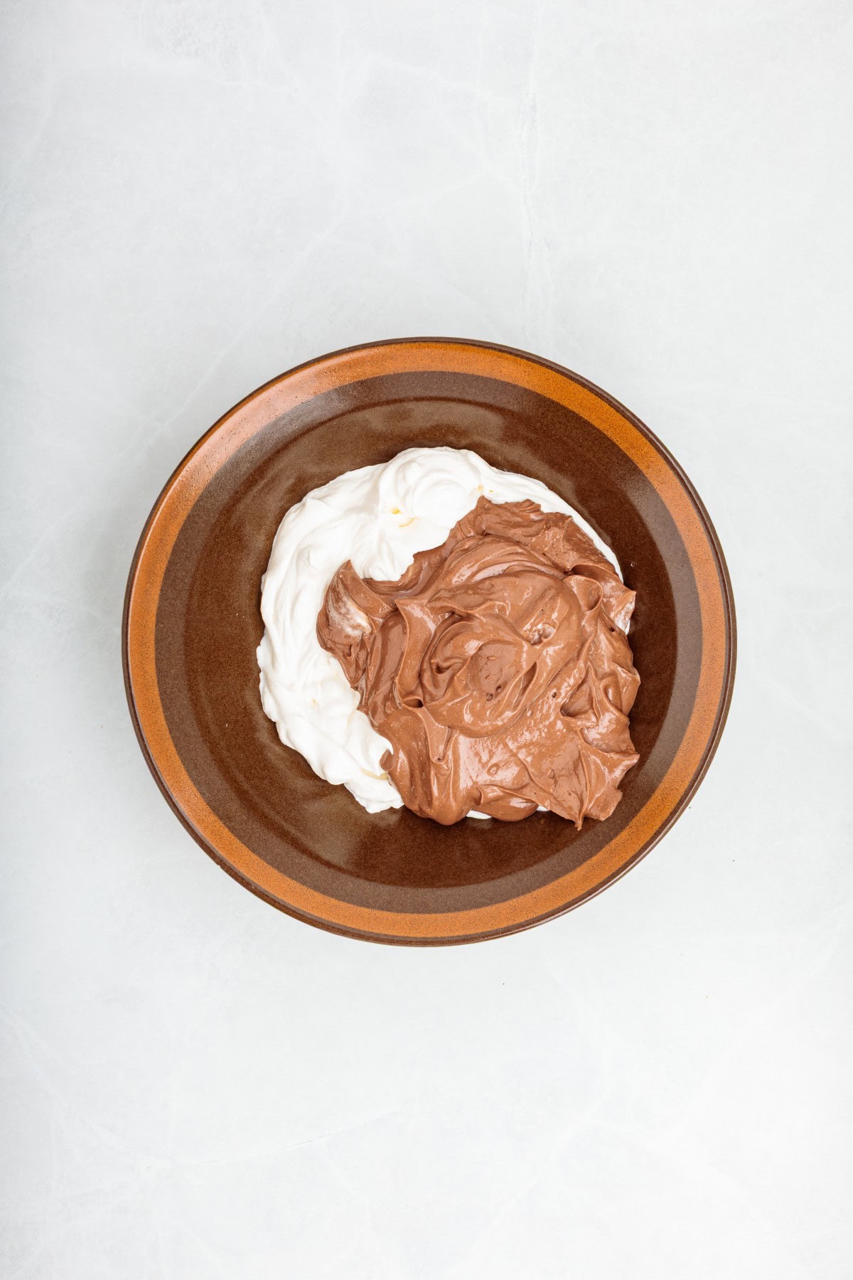 Chocolate mixture and whipped cream. 