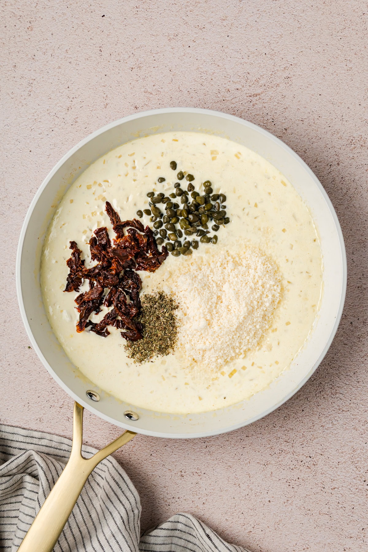 Adding cheese and aromatics. 