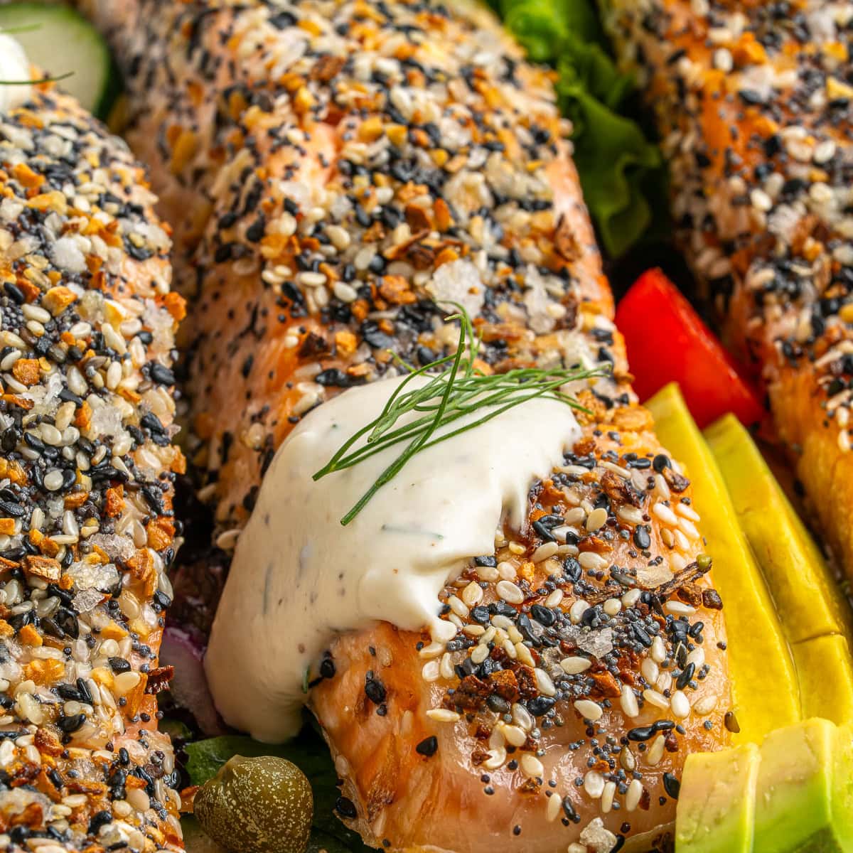 Close-up of Everything Bagel Salmon with sauce. 