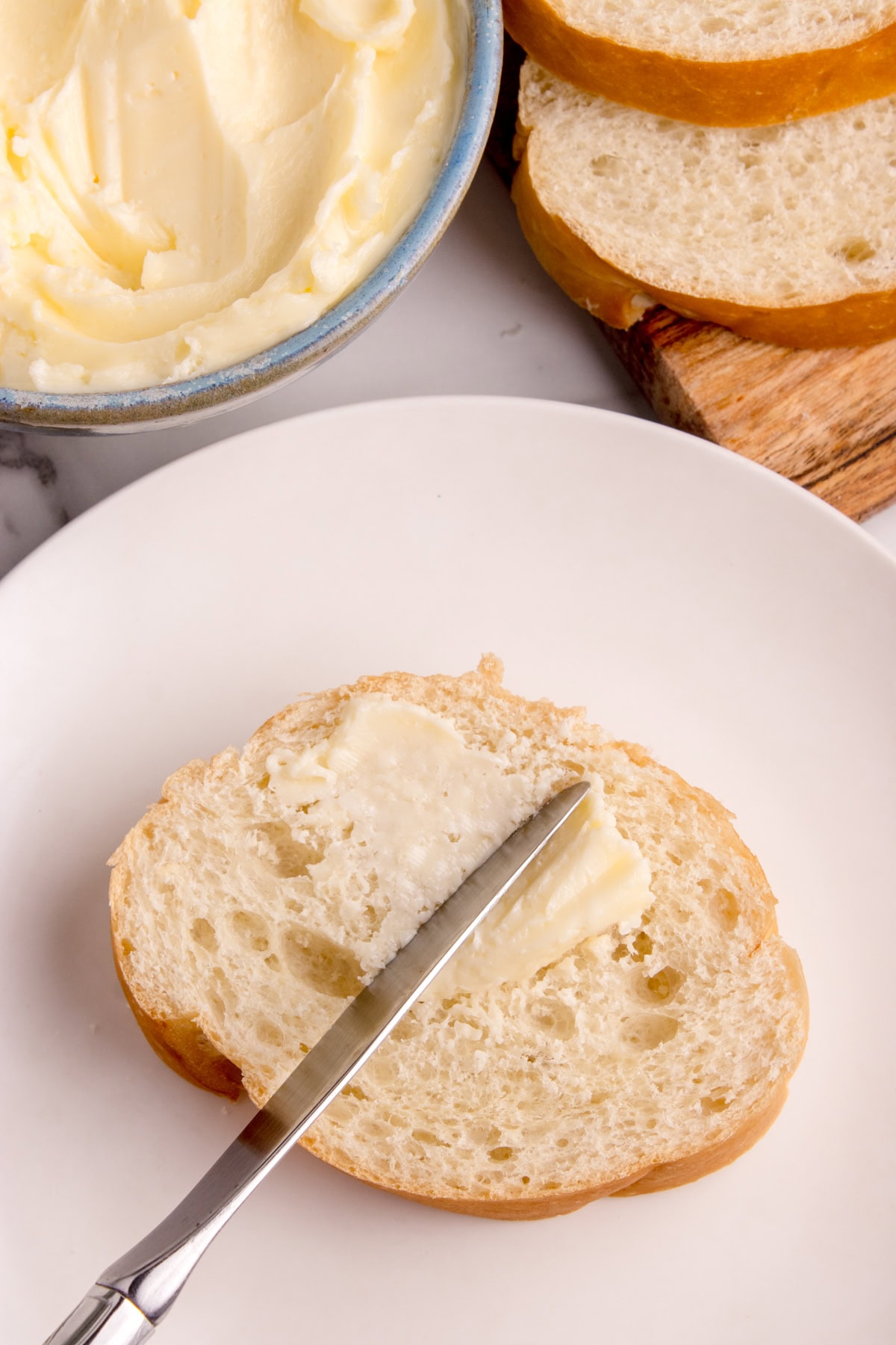 Buttering bread. 