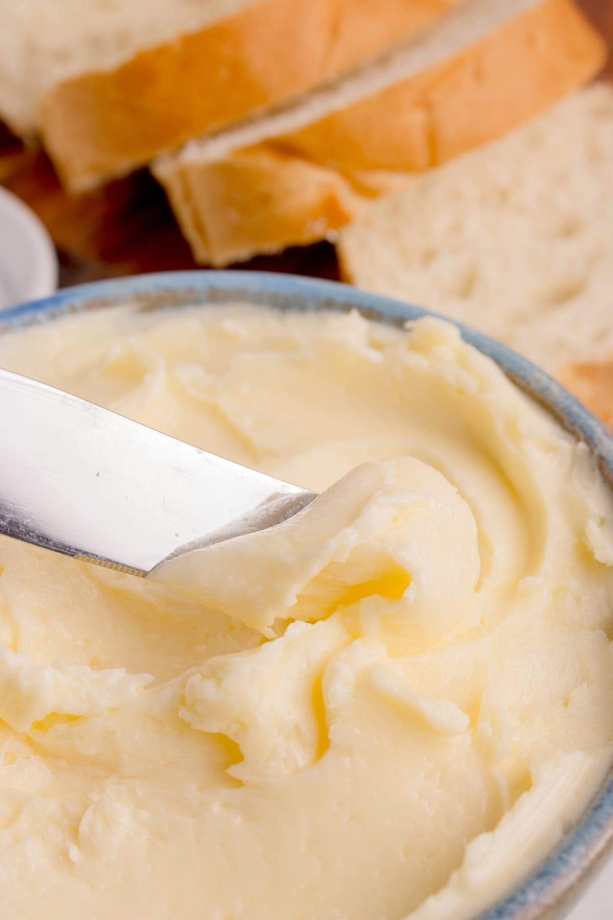 Taking butter with a knife. 