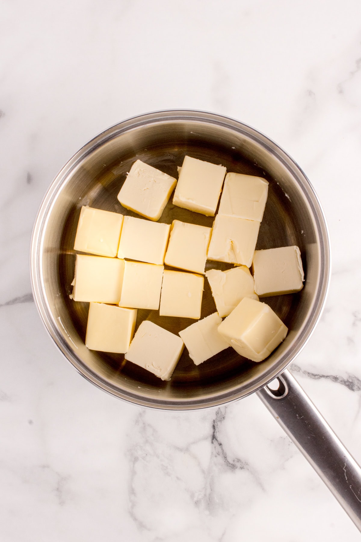Cubed butter in a pot. 
