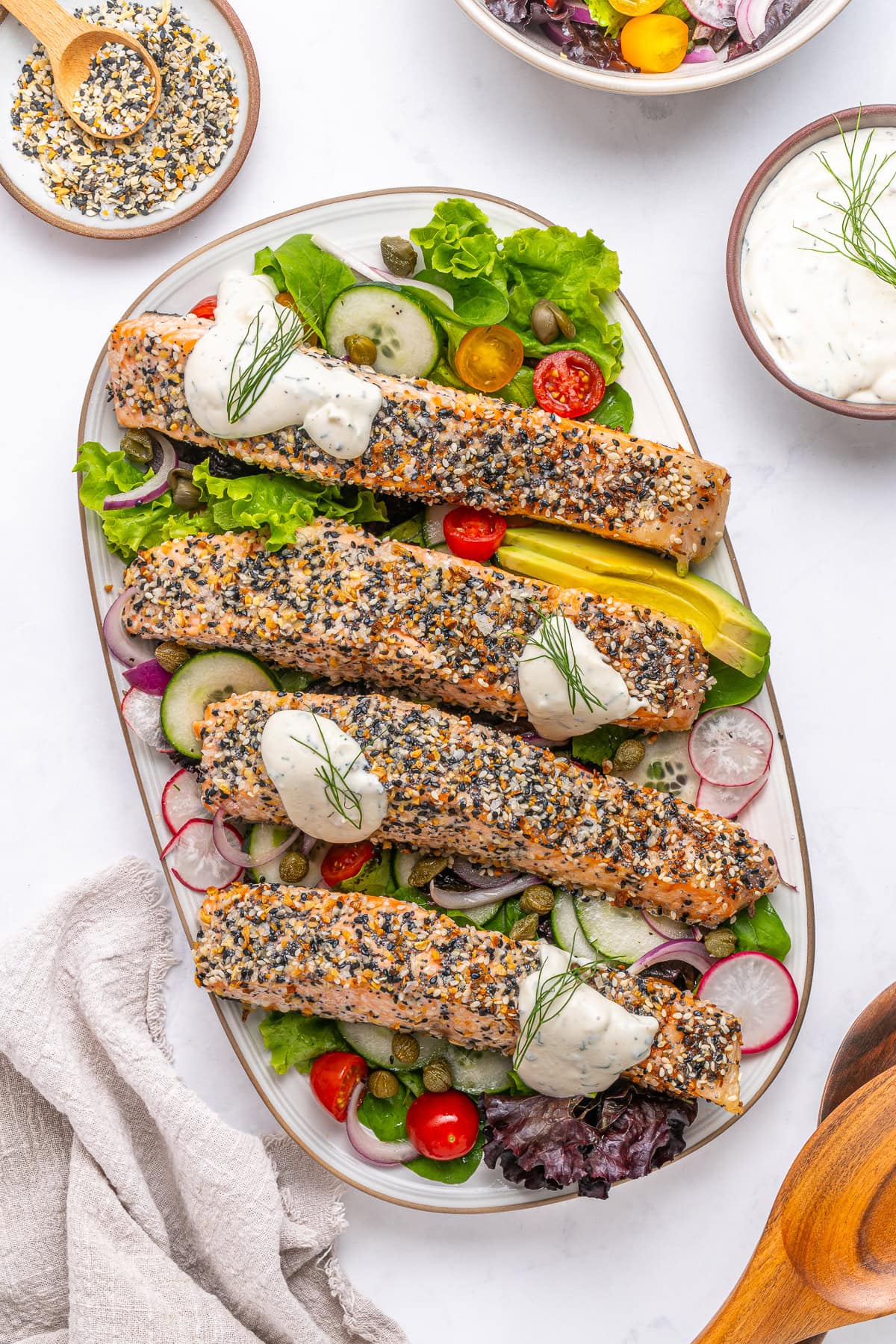Everything bagel salmon over lox salad.