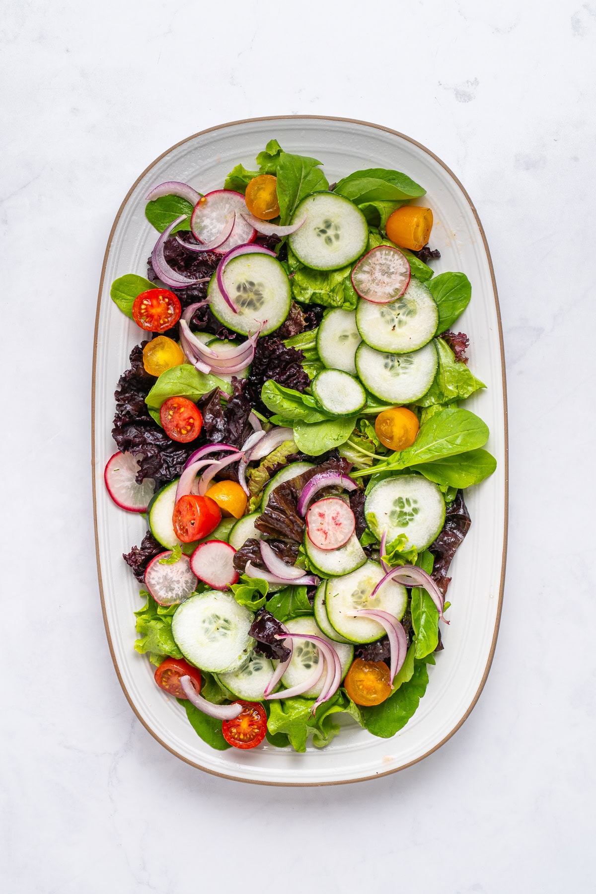Assembly of lox salad.