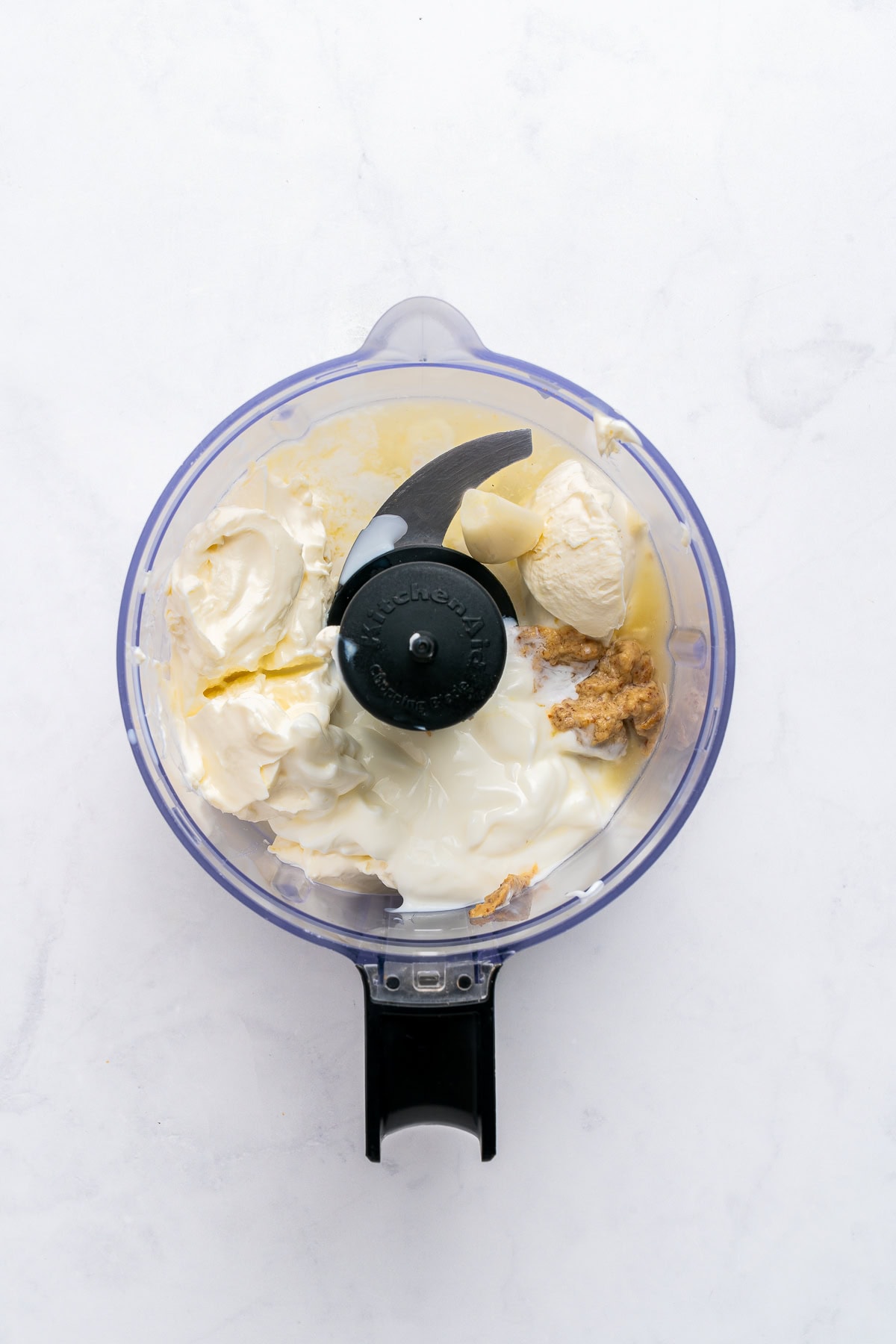 Blending the cream cheese sauce.