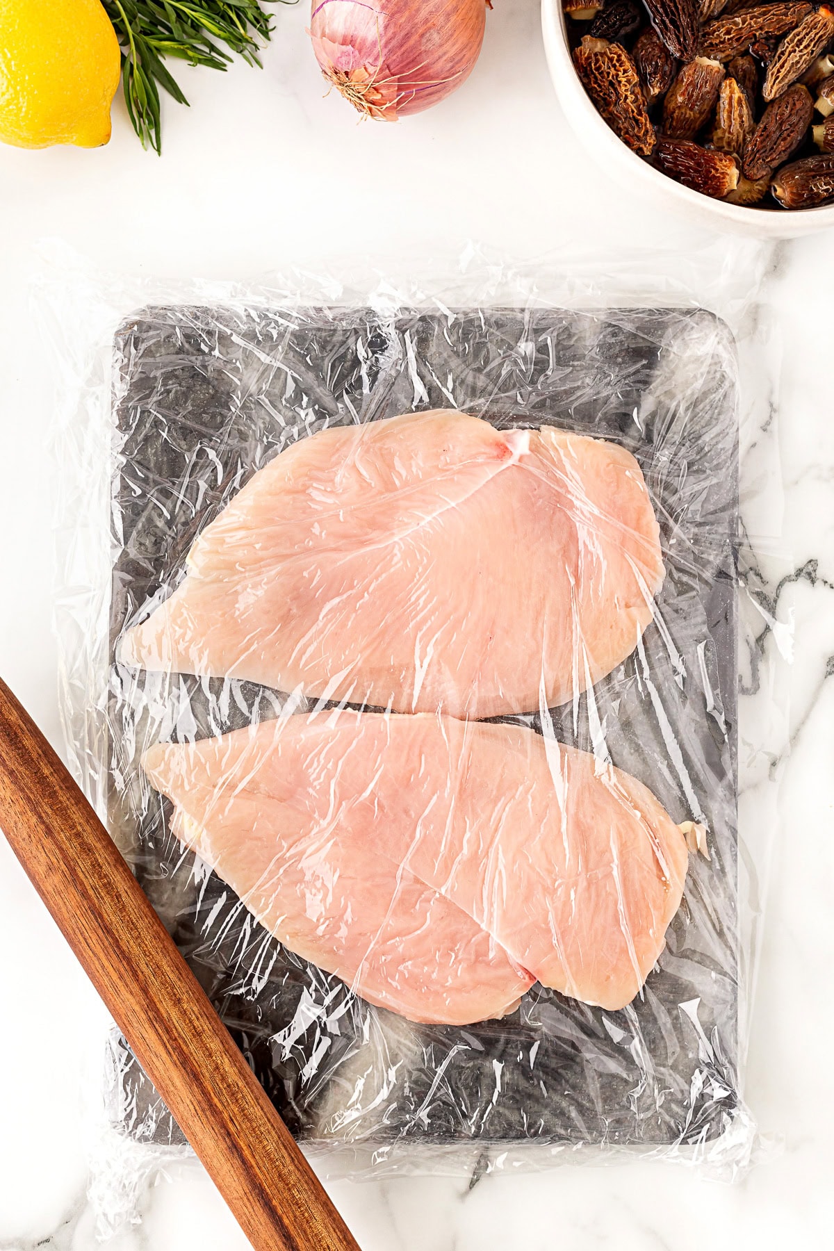 Pounding out chicken. 