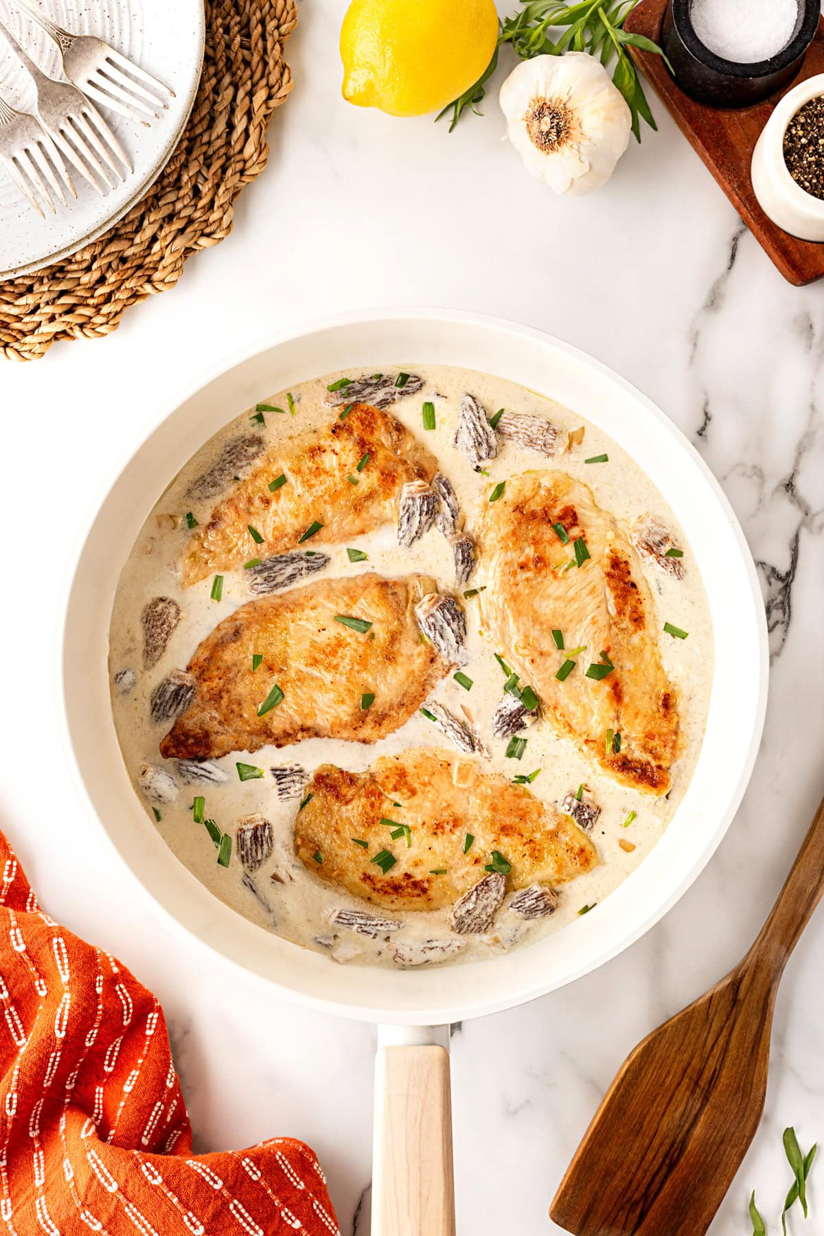 Adding chicken back to pan. 