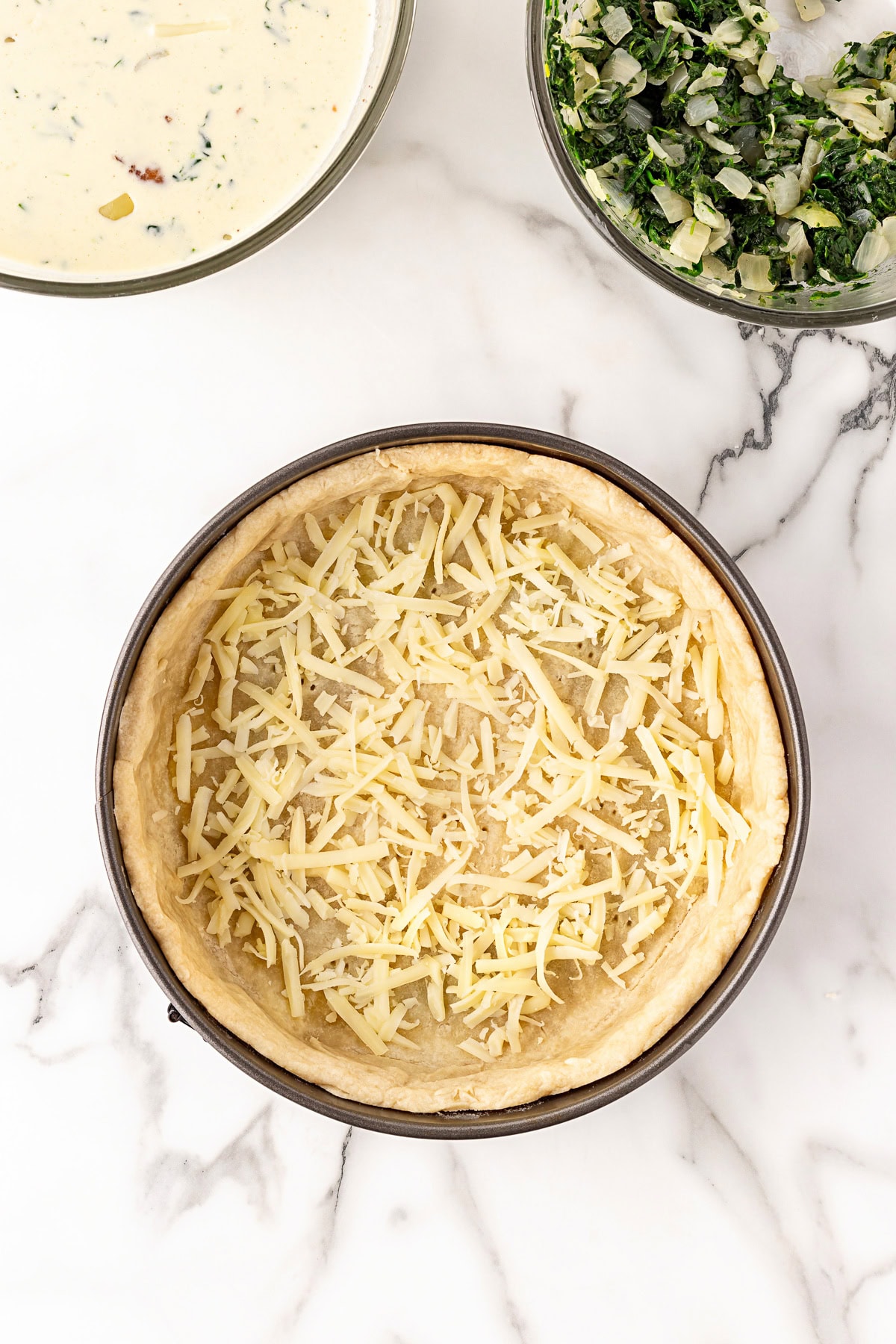 Cheese added to bottom of crust. 