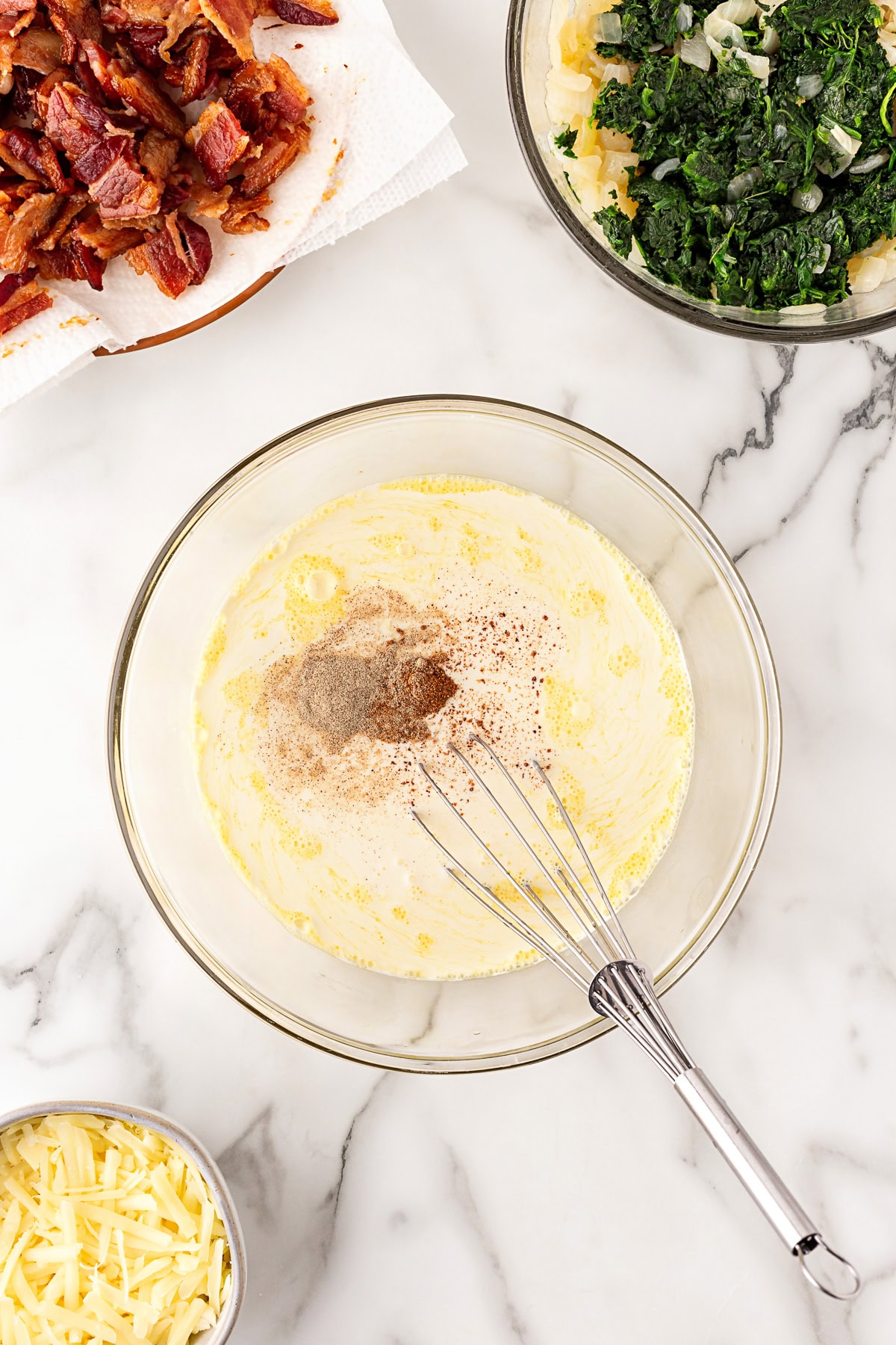 Wet ingredients and spices in bowl.