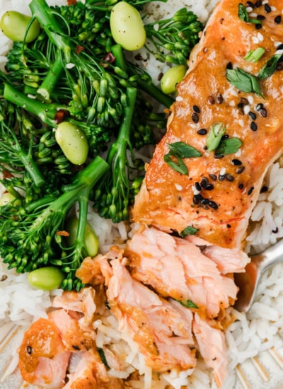 Flaking the salmon with a fork.