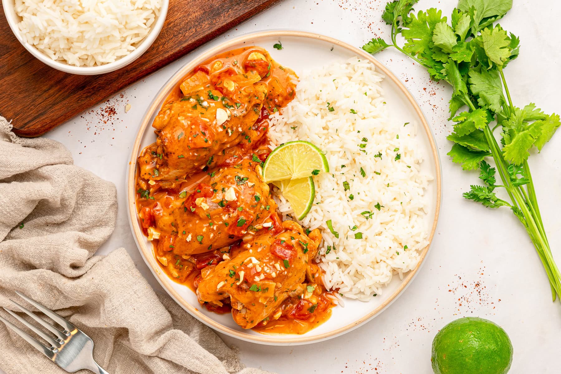 Juicy chicken thighs served with rice.
