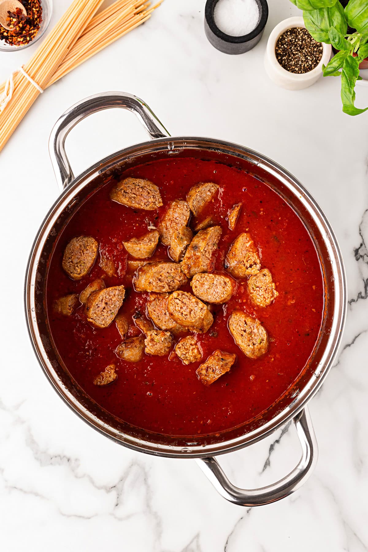 Sausage added to sauce. 
