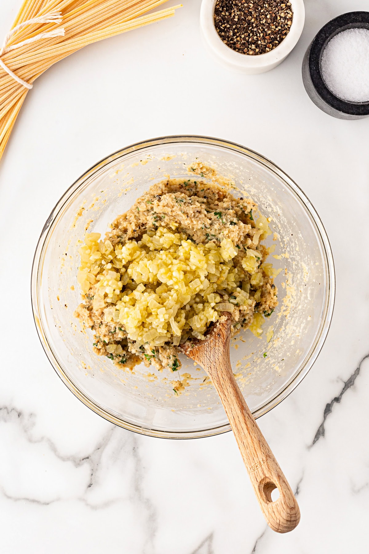 Egg-milk mixture added to dry ingredients. 